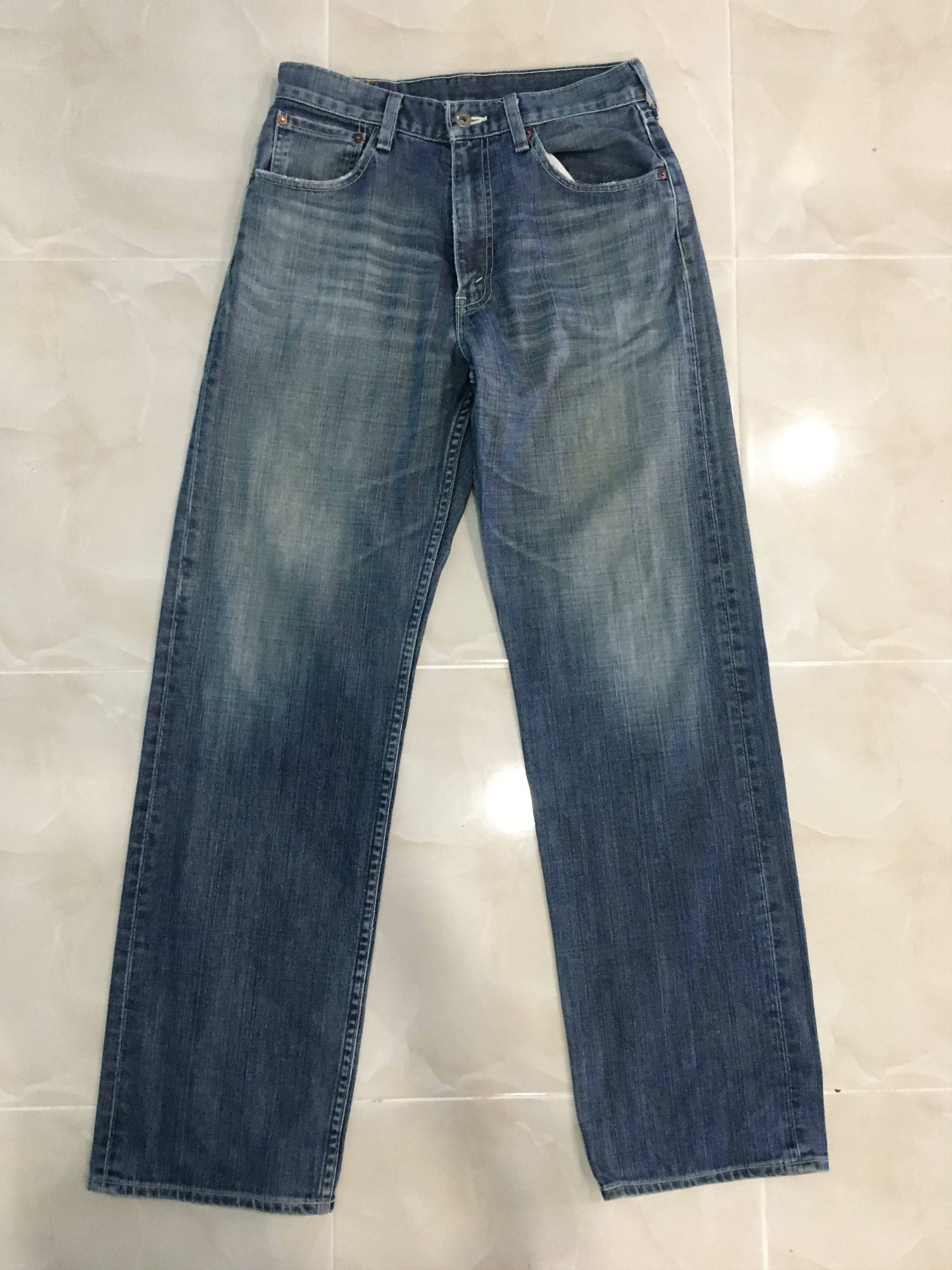 Distressed Levis 504 Jeans