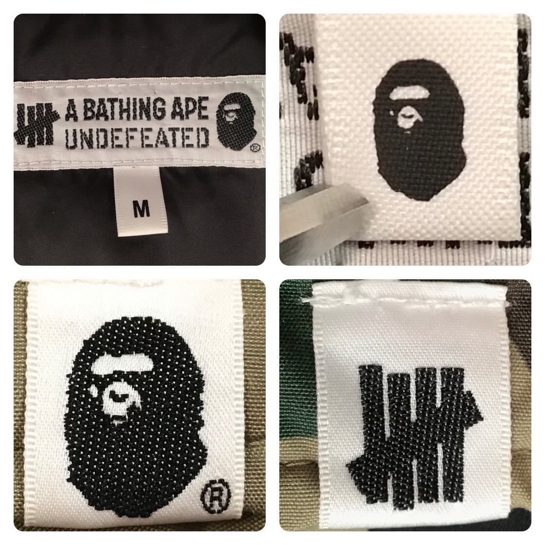 Bape × Undefeated Undefeated × BAPE camo Shark full zip hoodie down jacket Size US M / EU 48-50 / 2 - 9 Thumbnail