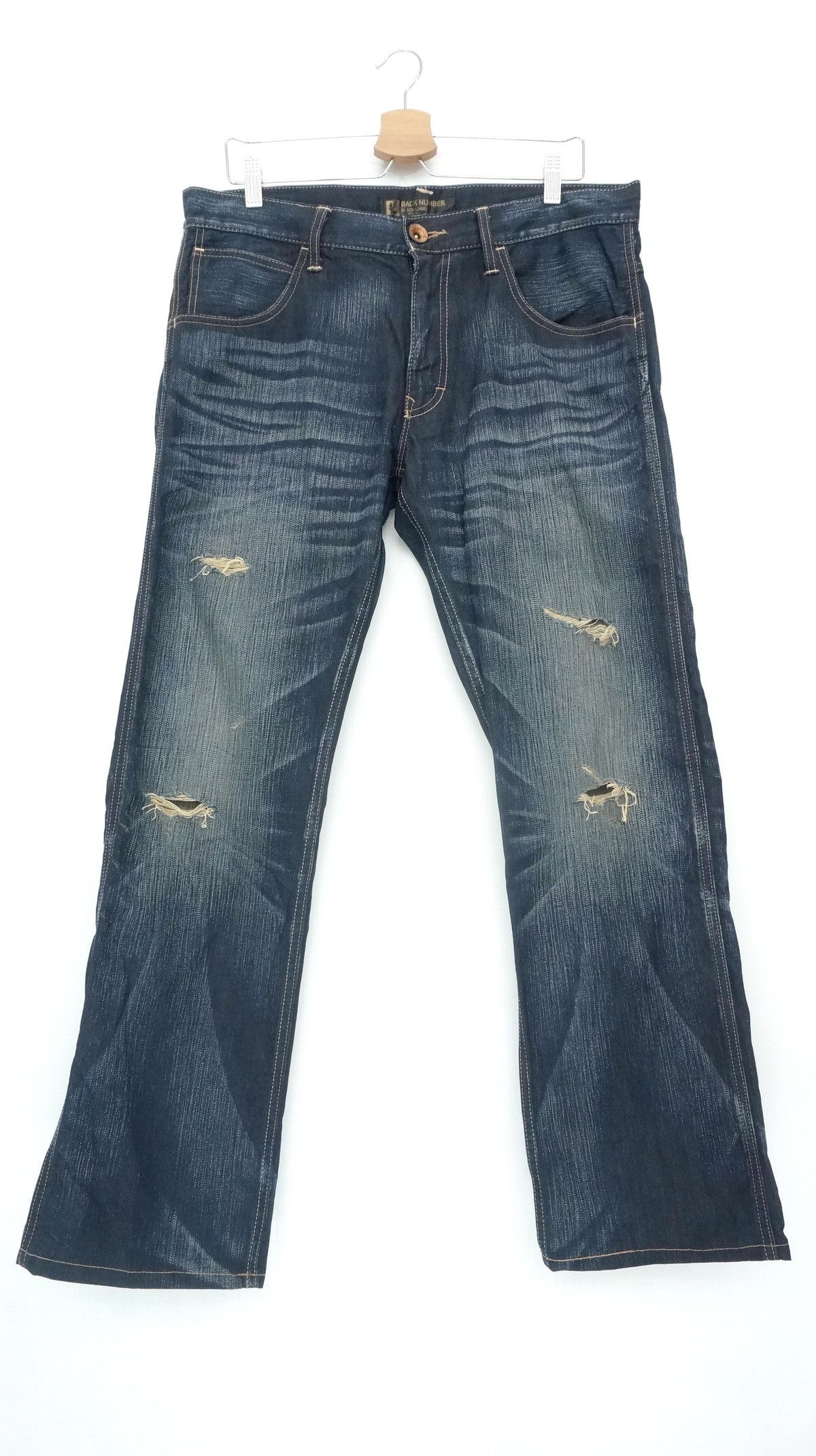 BACK NUMBER Cinch Back Distressed Jeans
