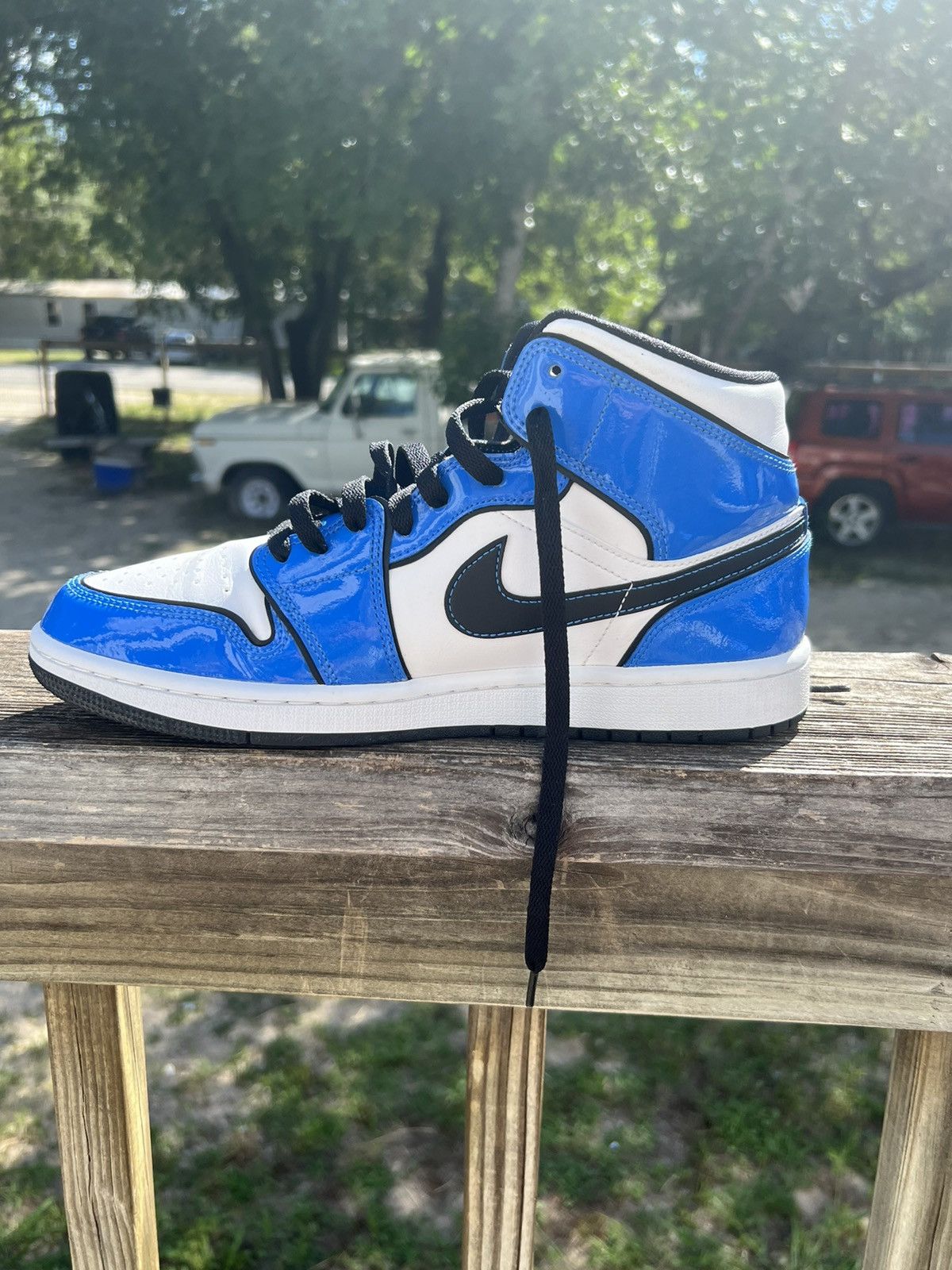 jordan 1 mid signal blue men