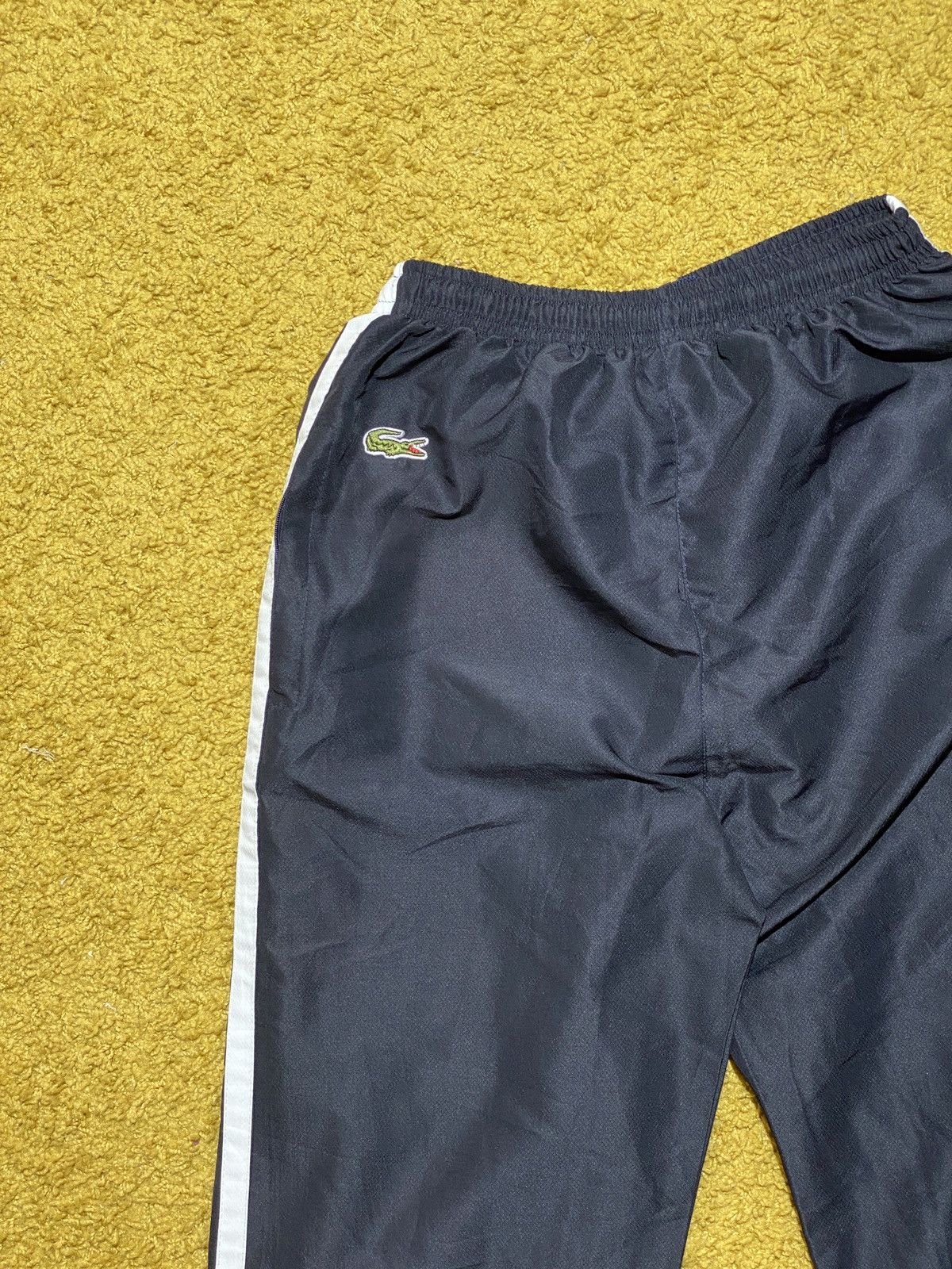 Grey lacoste guppy online pants