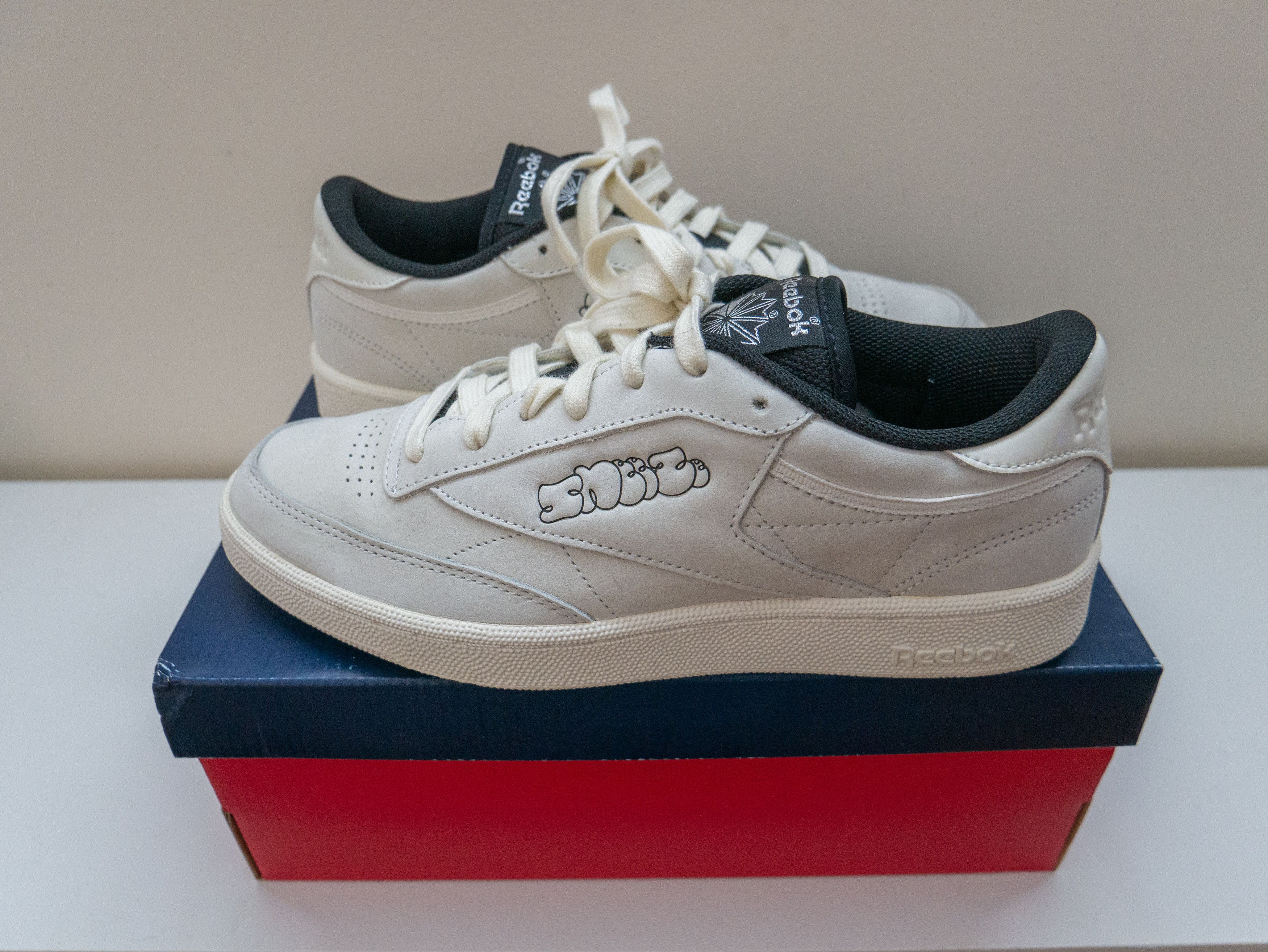image of Reebok x Sneeze Magazine 2020 Club C Sneeze Magazine Shoes in Chalk/Black/Paper, Men's (Size 9)