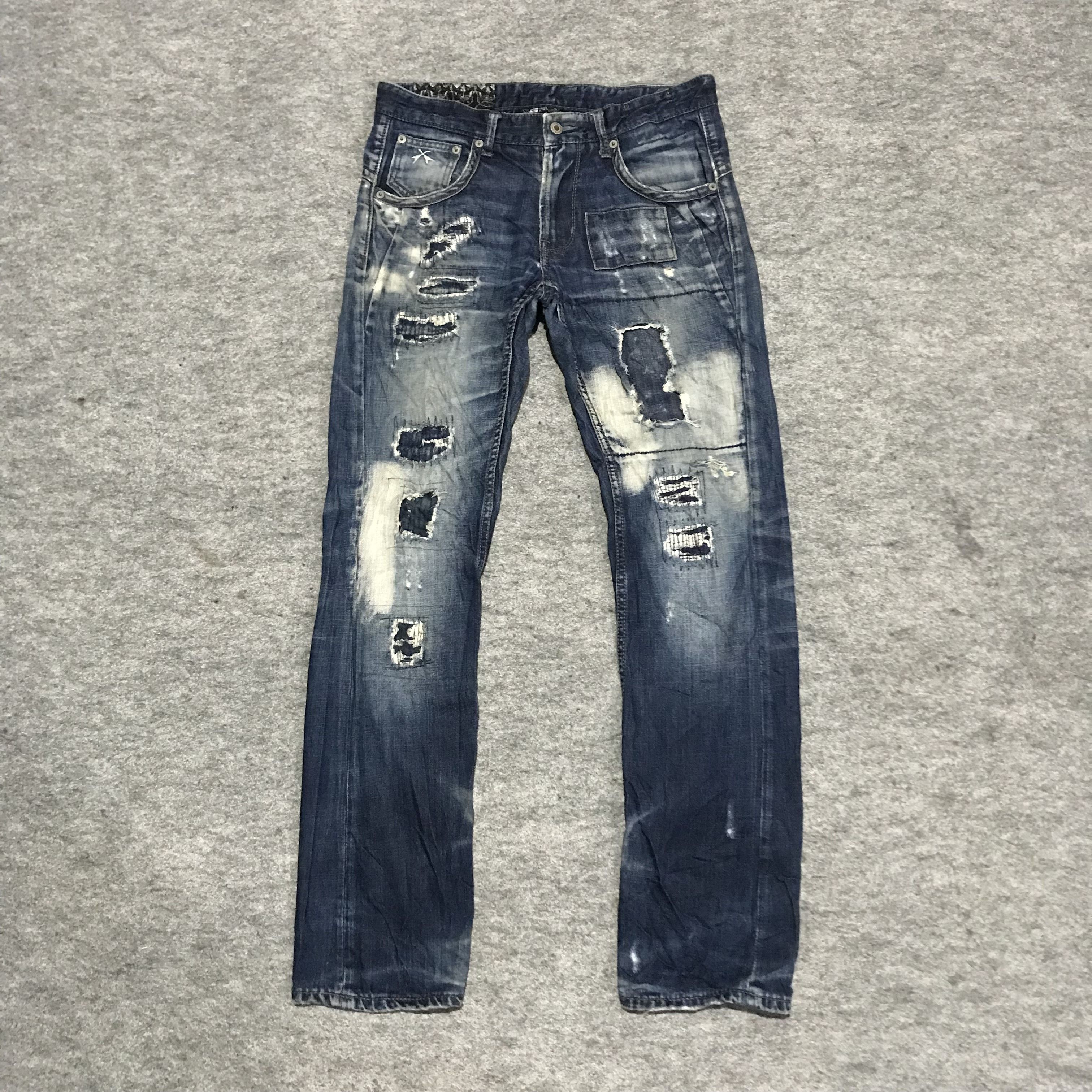 Vintage distressed denim Meteorite laboratories jeans