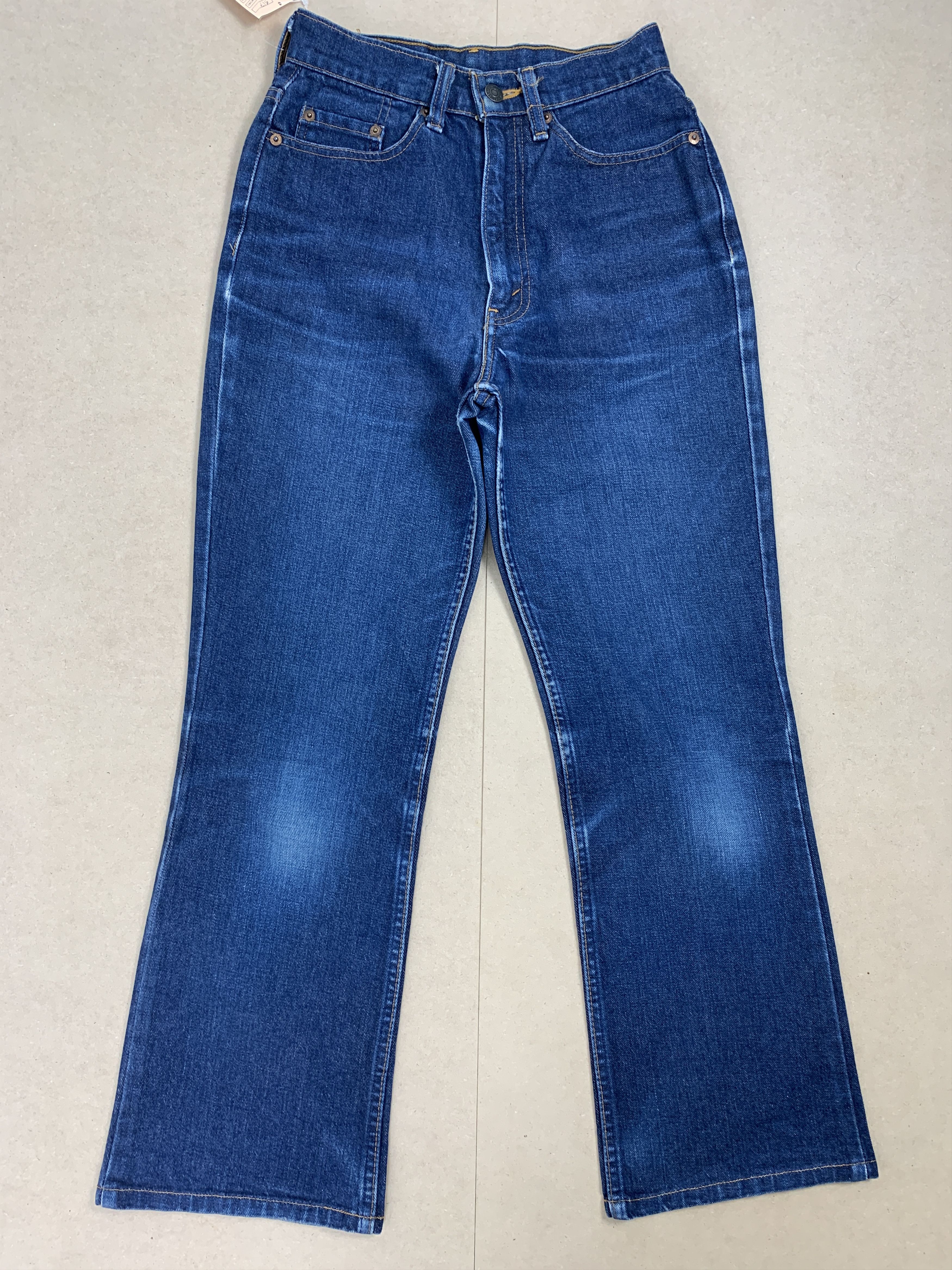 image of Levis x Vintage Levi's 517 Flare Bootcut Faded Mid Wash Jeans in Blue Denim, Women's (Size 22)