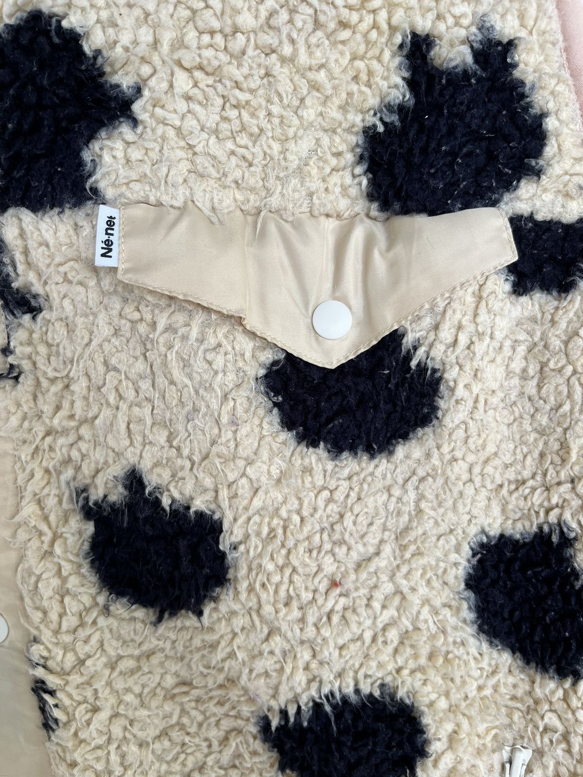 ISSEY MIYAKE NE-NET COW PRINTED SHERPA FLEECE VEST