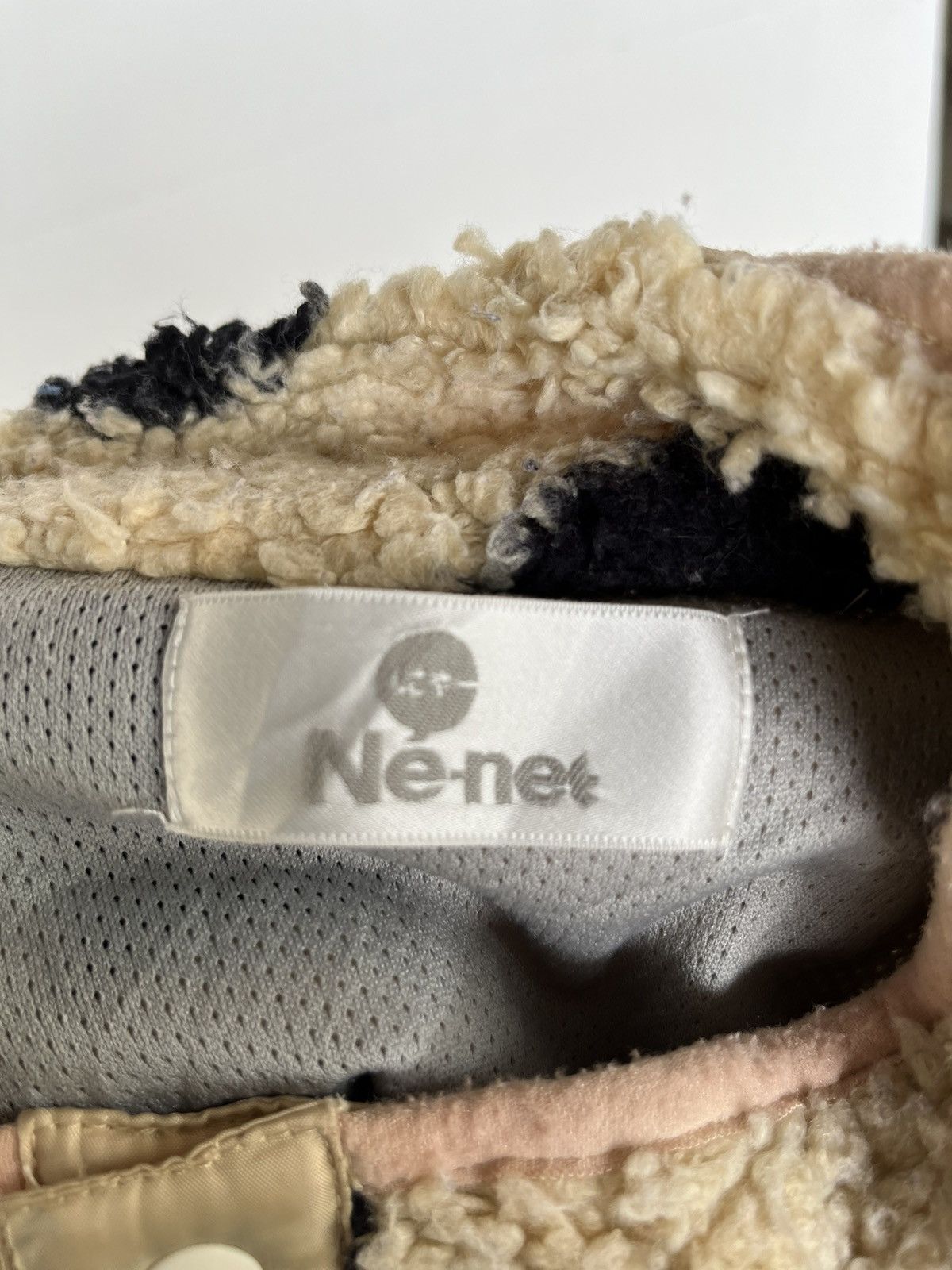 ISSEY MIYAKE NE-NET COW PRINTED SHERPA FLEECE VEST