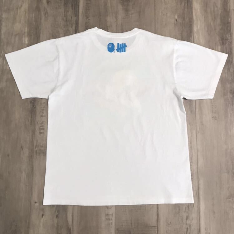 Bape × Undefeated BAPE x undefeated surfing T-shirt Size US L / EU 52-54 / 3 - 4 Thumbnail
