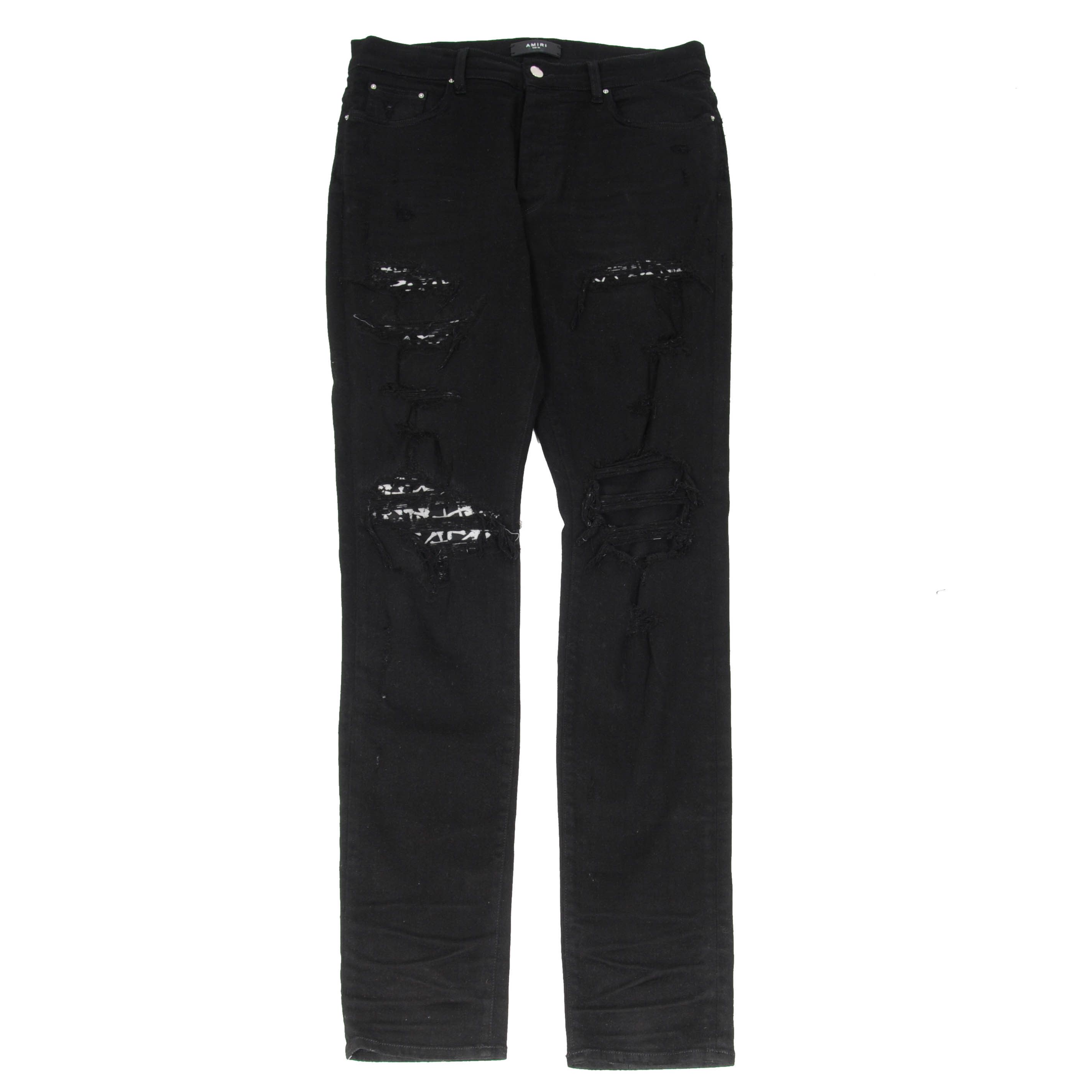image of Amiri Art Patch Cross Bone Denim Skinny Jeans - 00987 in Black, Men's (Size 36)