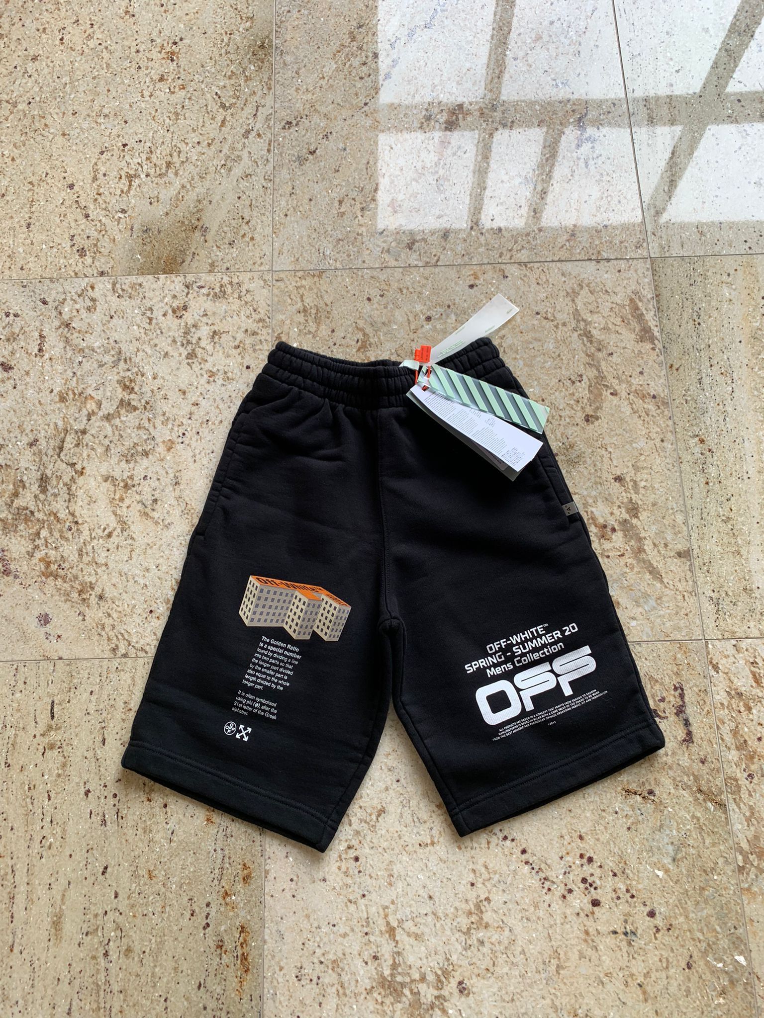 image of Off White Wavy Line Logo Sweat Shorts in Black, Men's (Size 26)