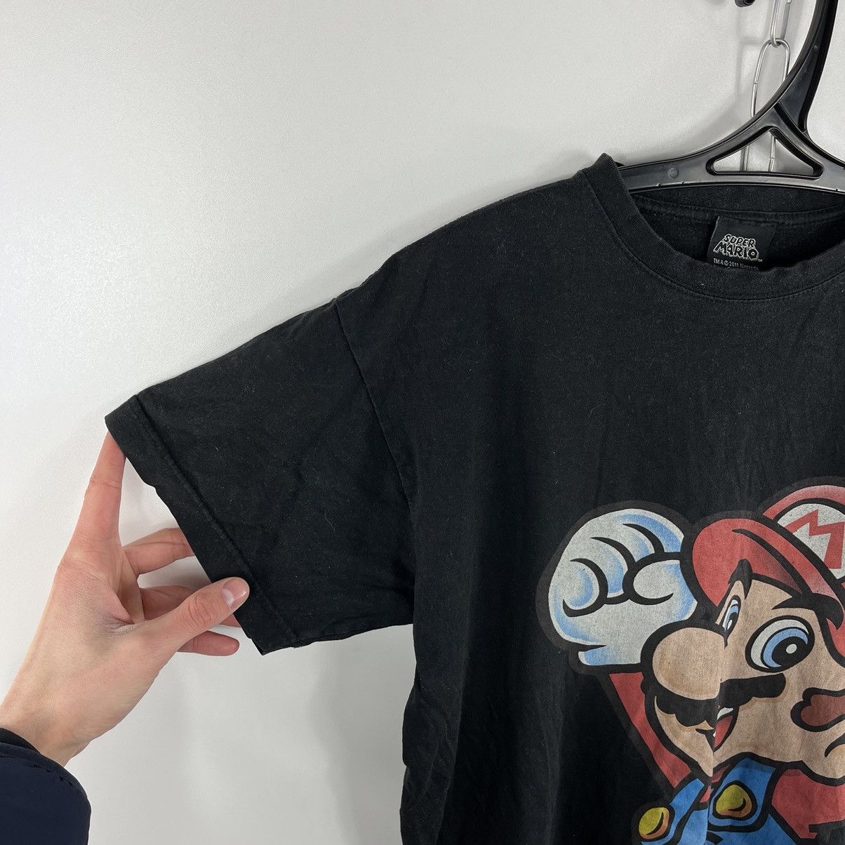 Nintendo × Vintage Vintage Super Mario 2011 Big Logo T-Shirt Black Size M Size US M / EU 48-50 / 2 - 3 Thumbnail