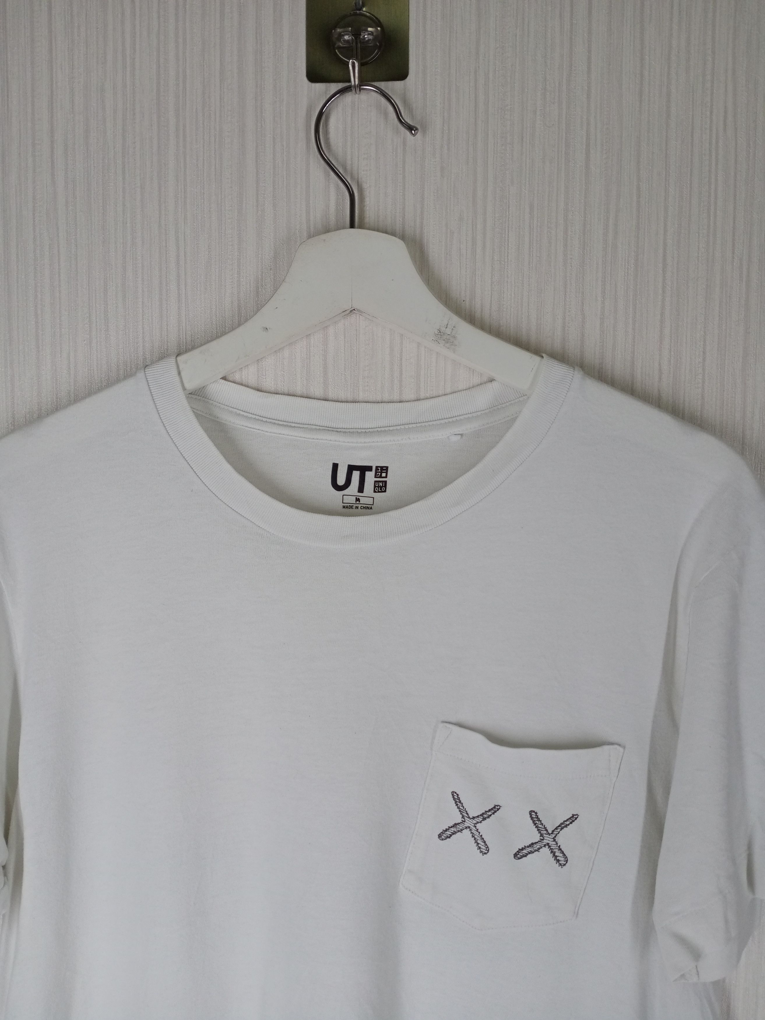 Kaws × Uniqlo Kaws X Uniqlo Single Pocket Size US M / EU 48-50 / 2 - 5 Thumbnail