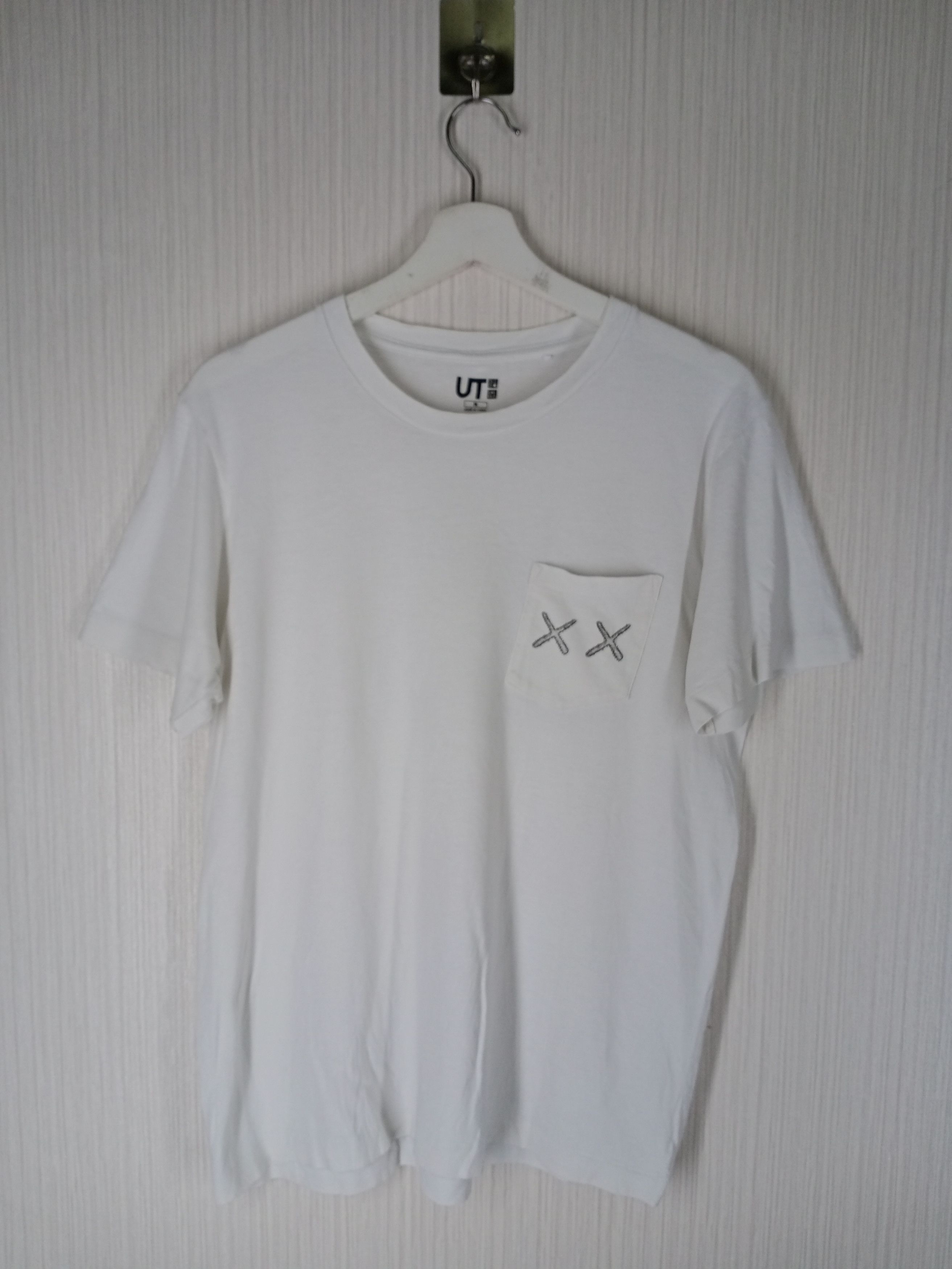 Kaws × Uniqlo Kaws X Uniqlo Single Pocket Size US M / EU 48-50 / 2 - 3 Thumbnail