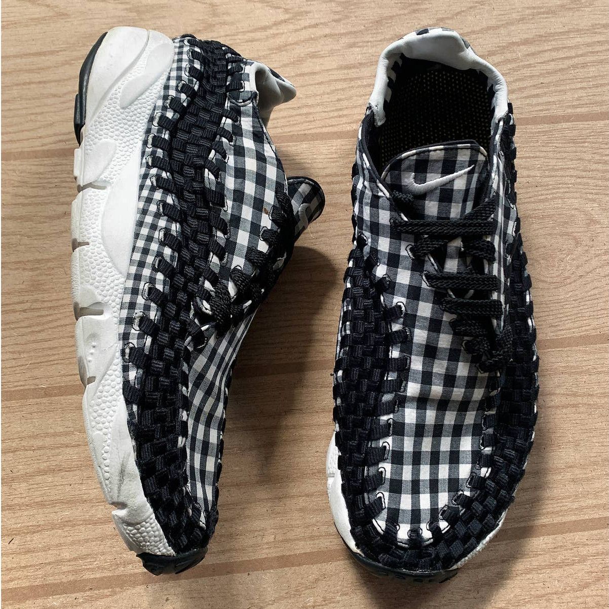 image of Nike Air Footscape Woven Motion Sneakers in Black, Men's (Size 10)