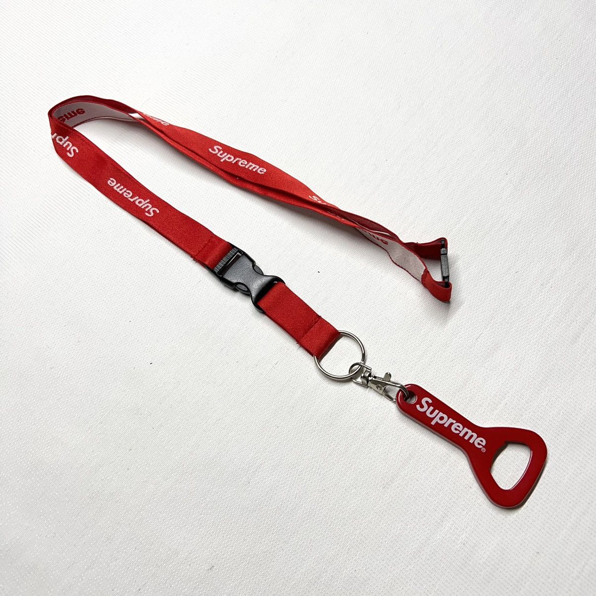 Supreme Bottle Opener Webbing Keychain FW 21 Red - Stadium Goods