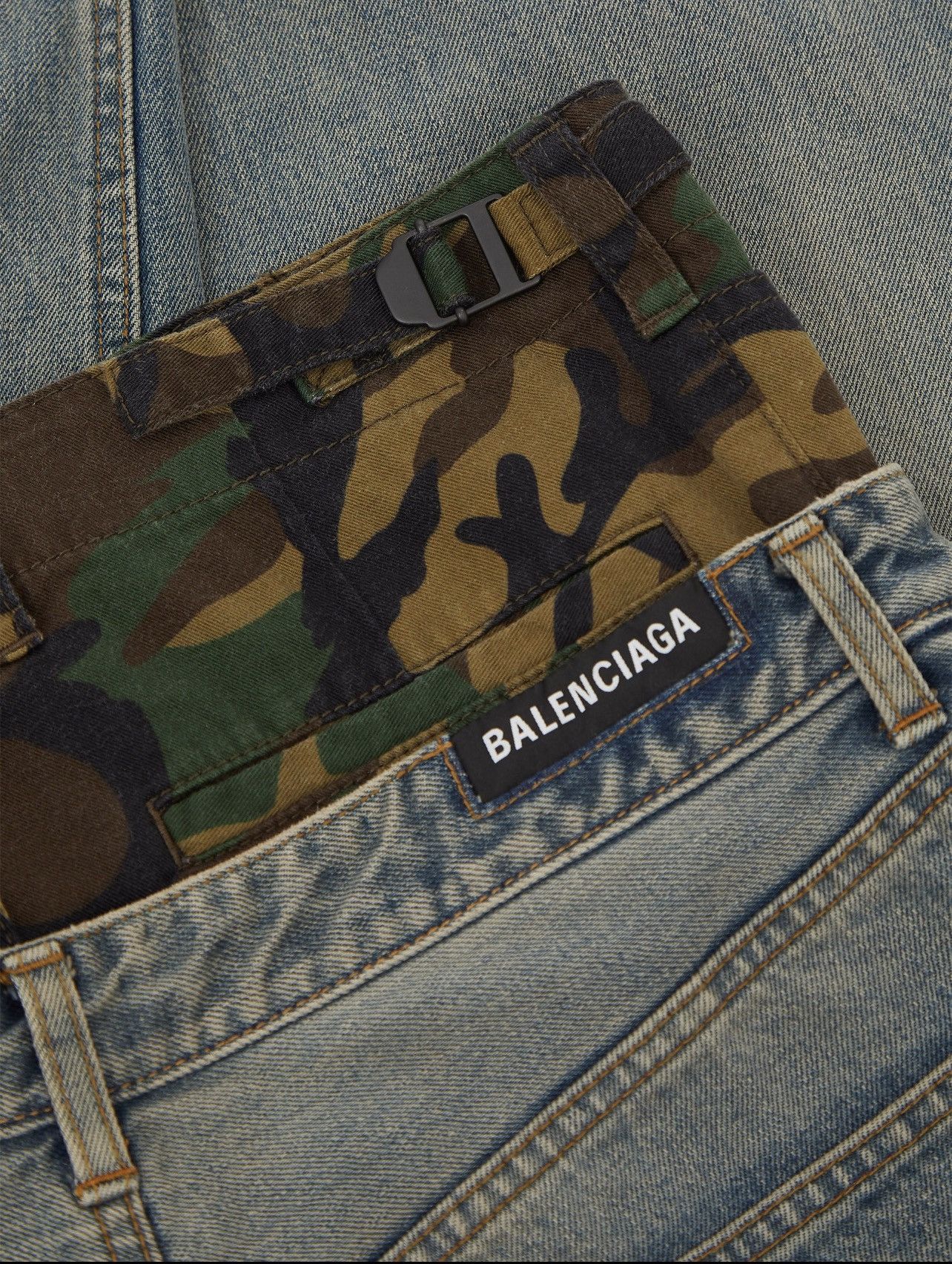 *RUNWAY* AW21 BALENCIAGA. Layered camouflage-panel jeans