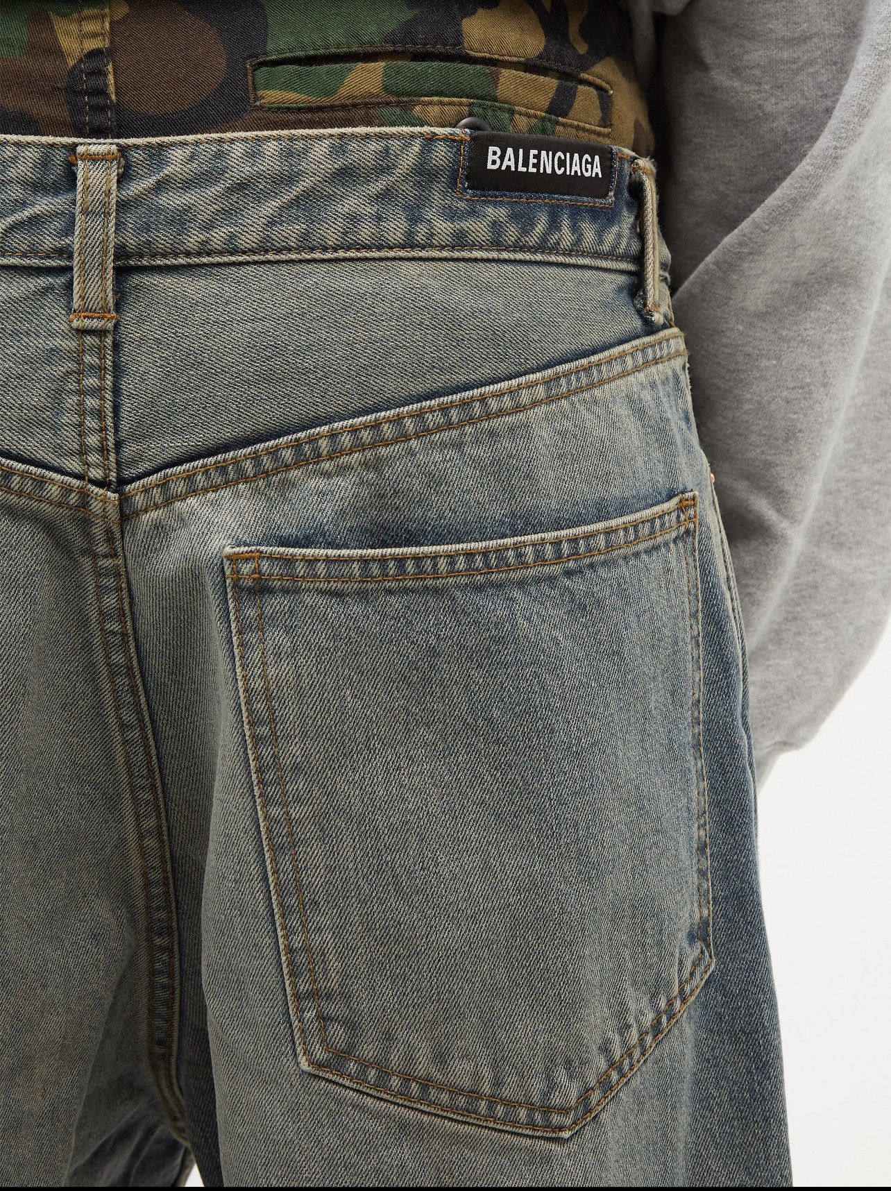 *RUNWAY* AW21 BALENCIAGA. Layered camouflage-panel jeans