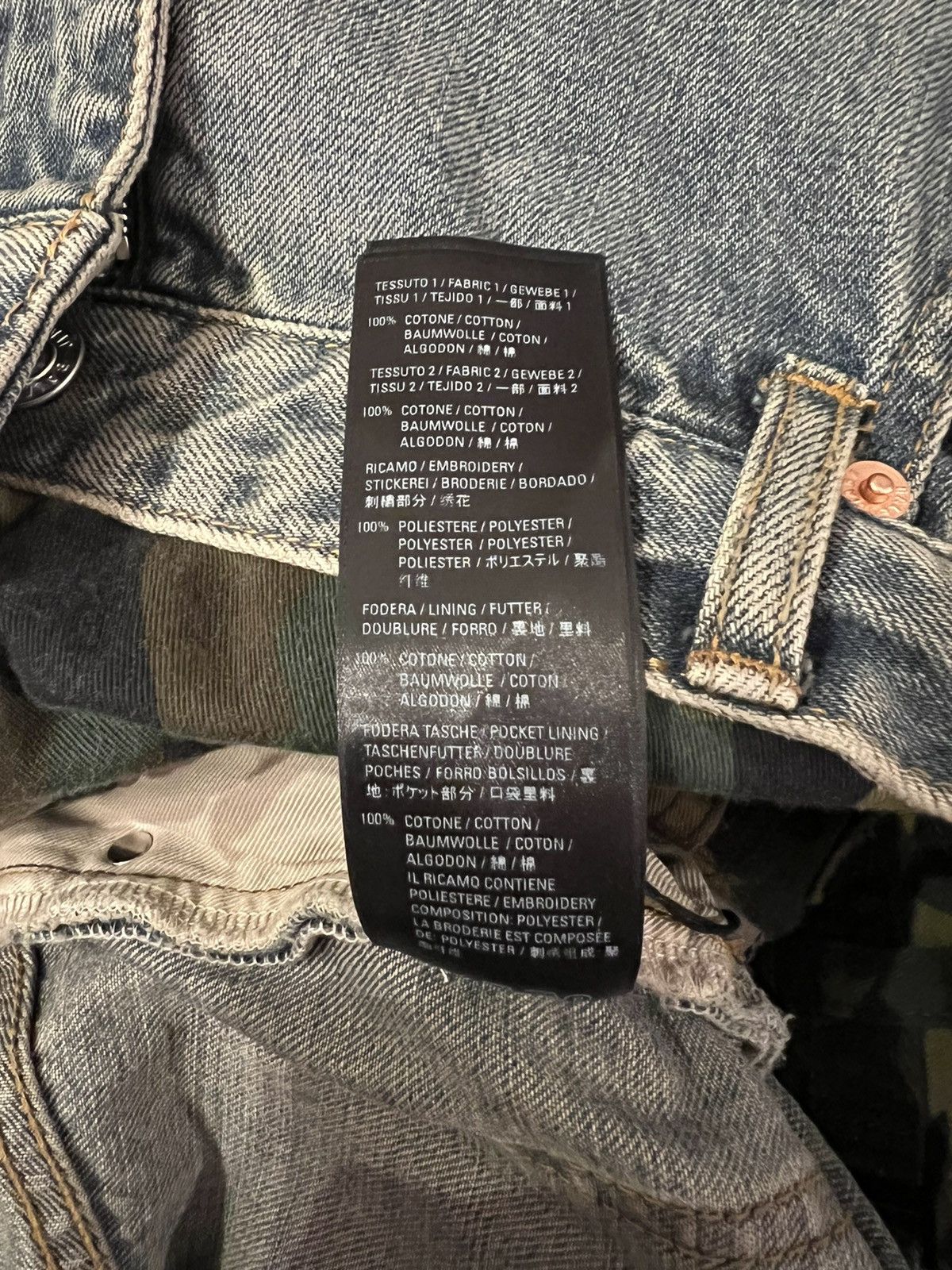 *RUNWAY* AW21 BALENCIAGA. Layered camouflage-panel jeans