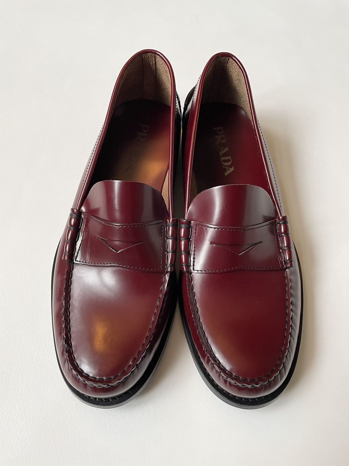 Prada Polished Oxblood Leather Loafers | Grailed