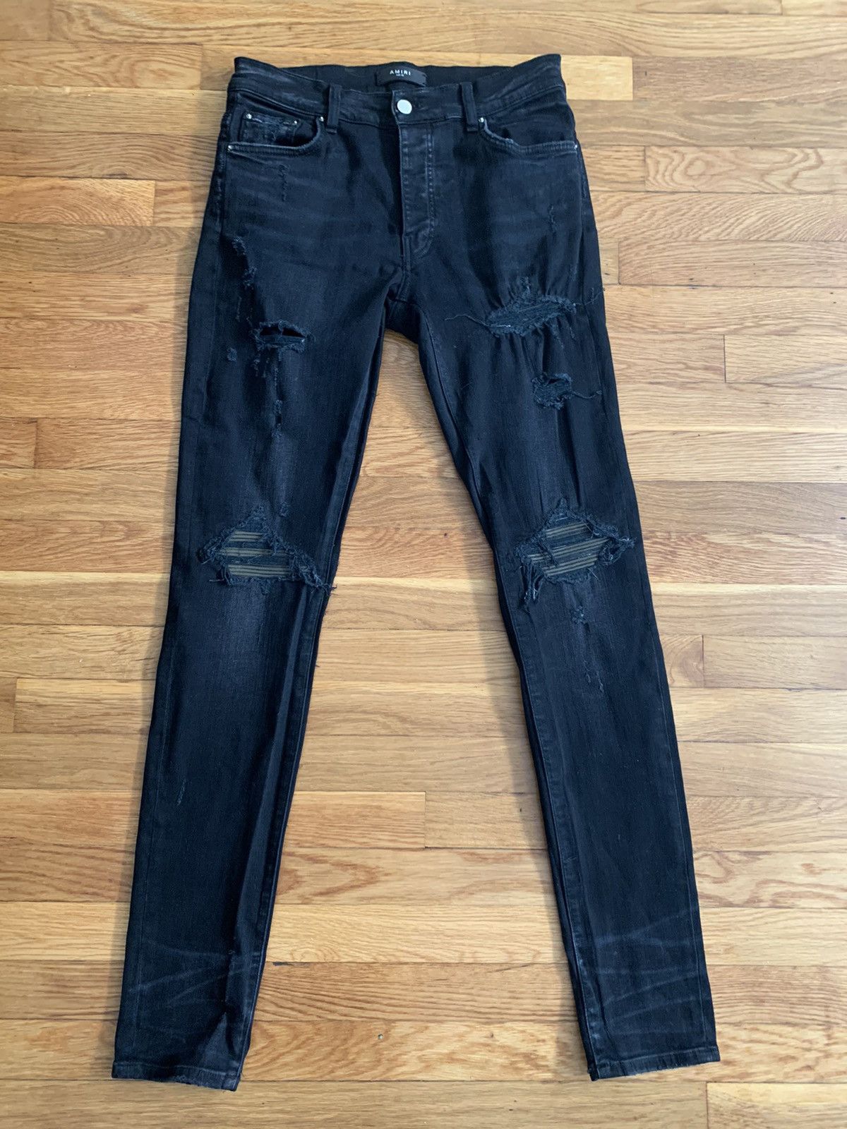 image of Amiri Black And Khaki Mx1 Patch Denim in Cargo Green, Men's (Size 32)