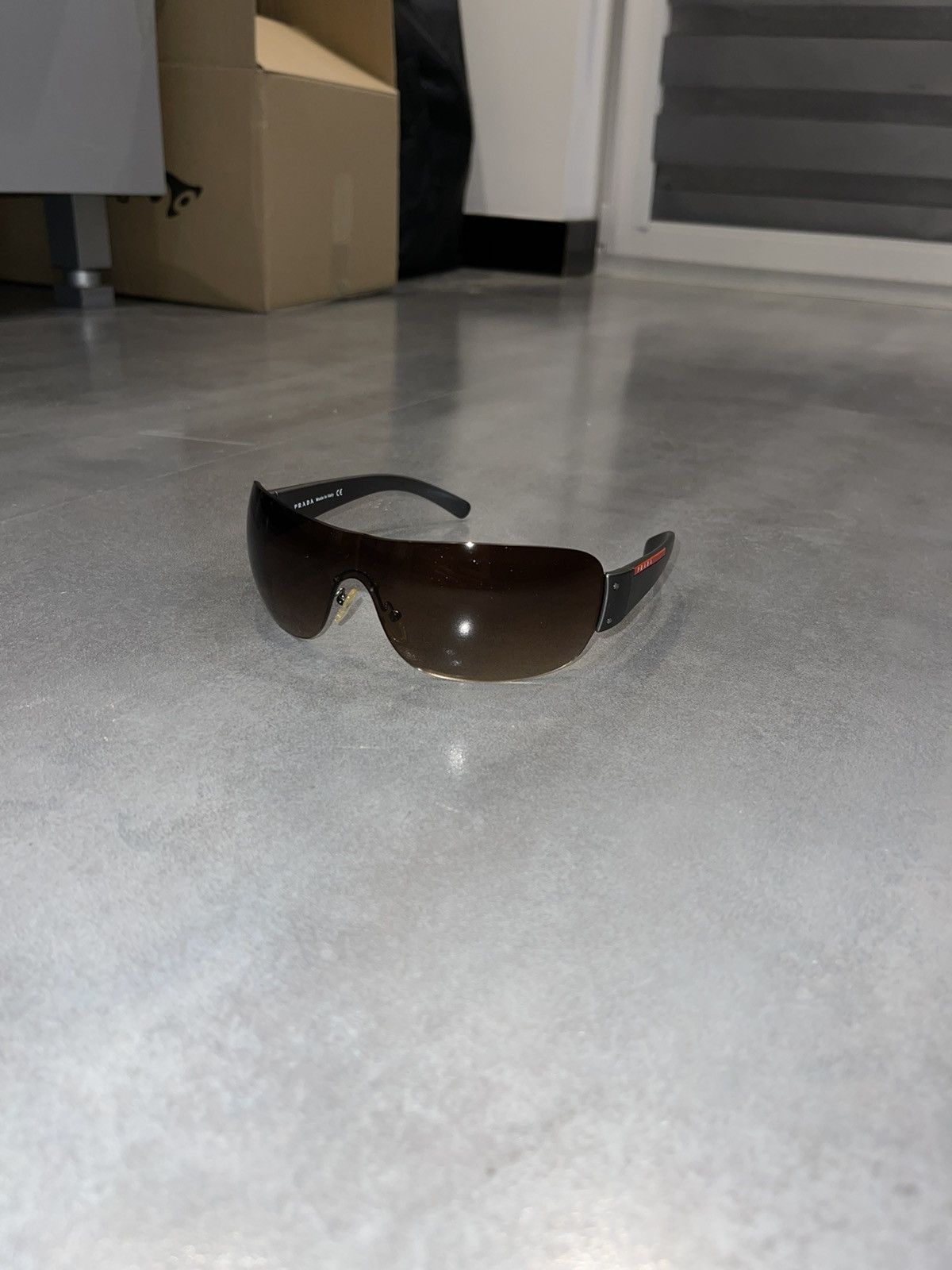 Prada SPS 07F Red Tab Logo Shield Sunglasses