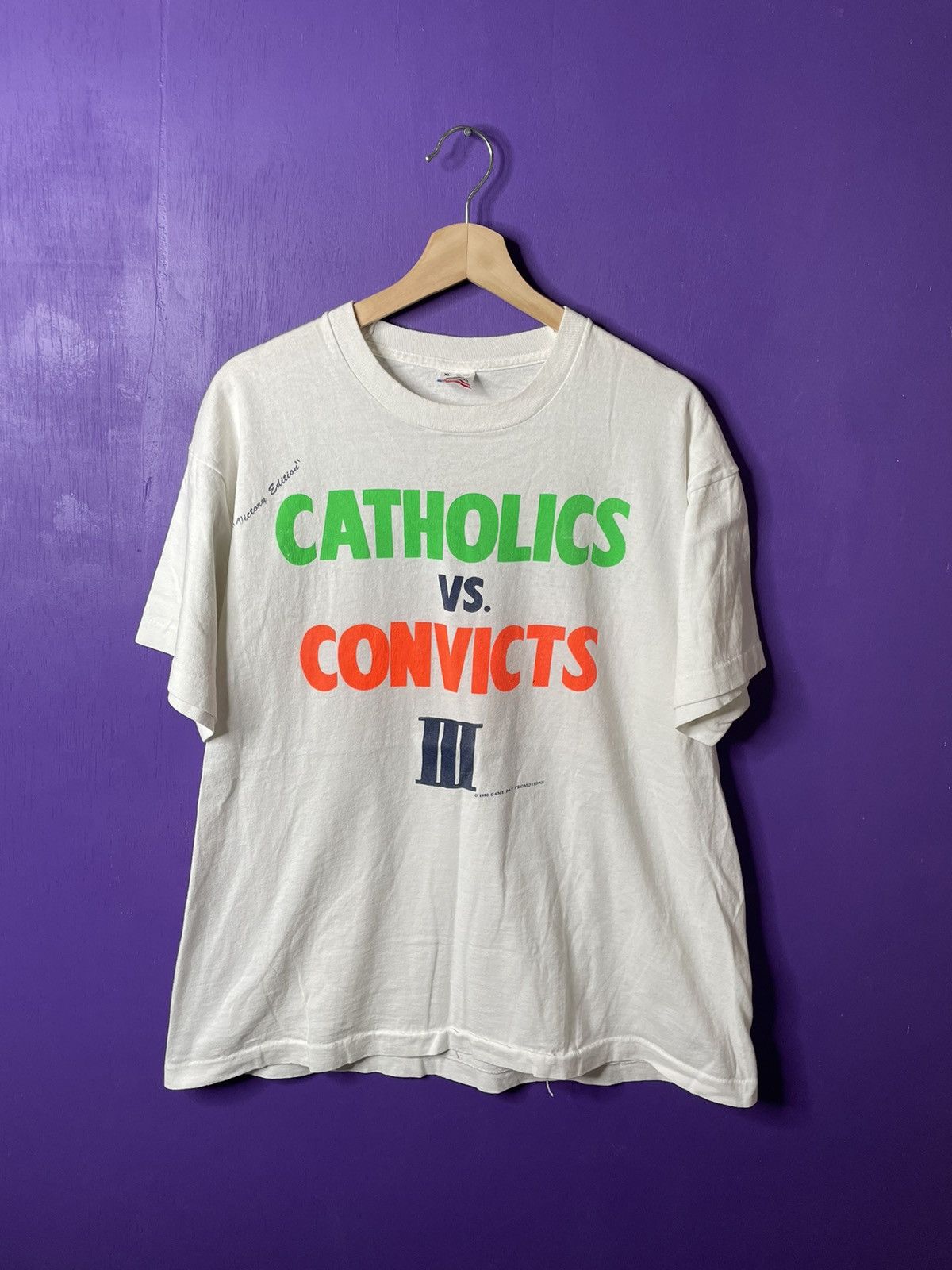 image of American College x Vintage 1990 Miami/notre Dame Catholics Vs Convicts T-Shirt in White (Size XL)