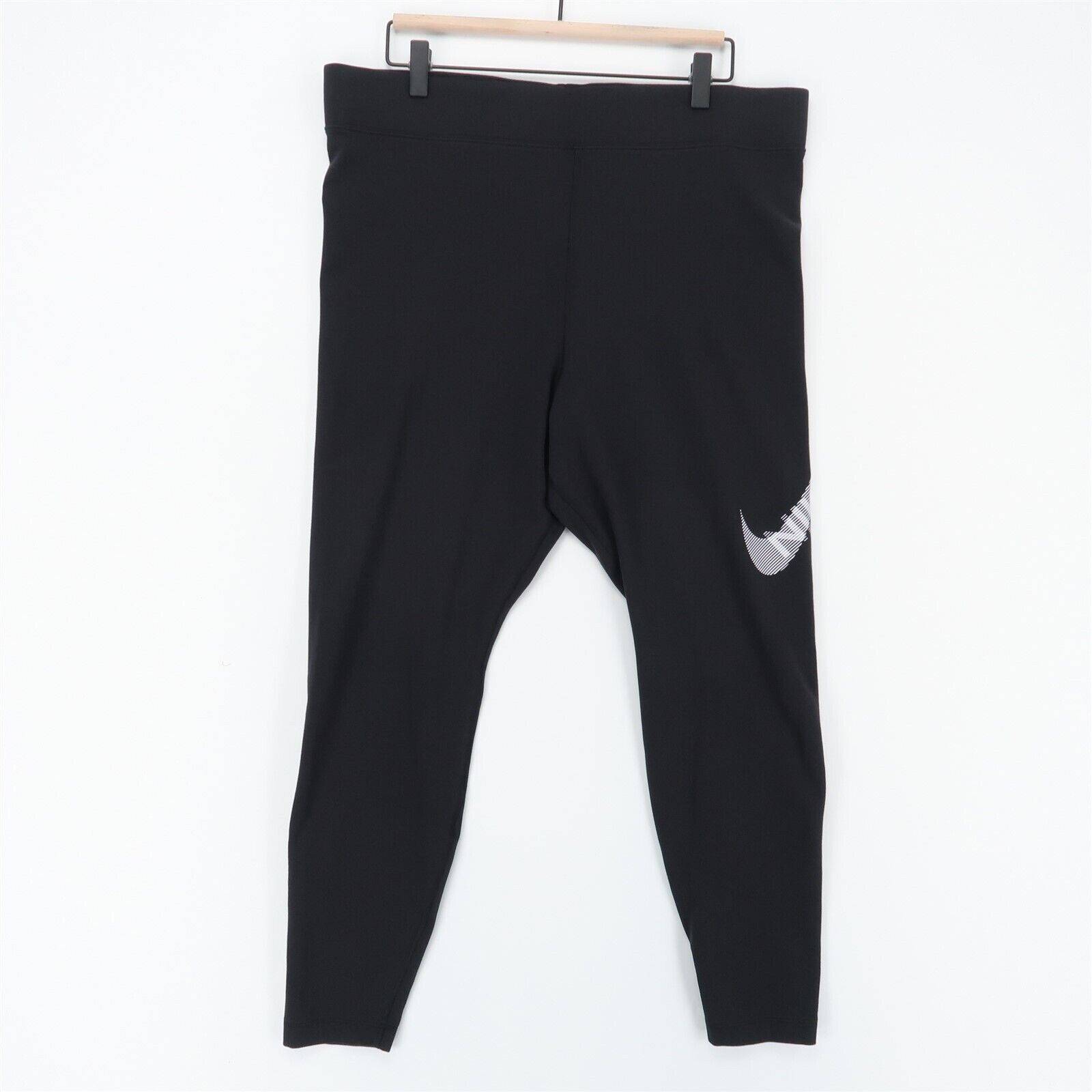 nike swoosh tight