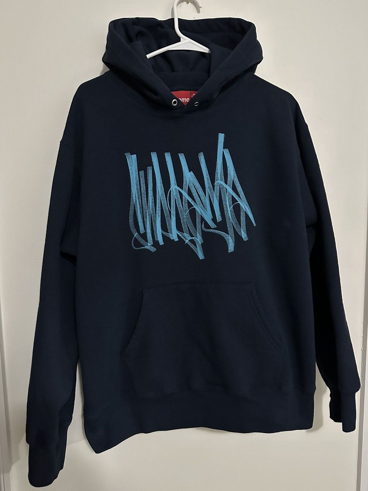 image of Supreme Tag Hooded Sweatshirt in Blue, Men's (Size Medium)