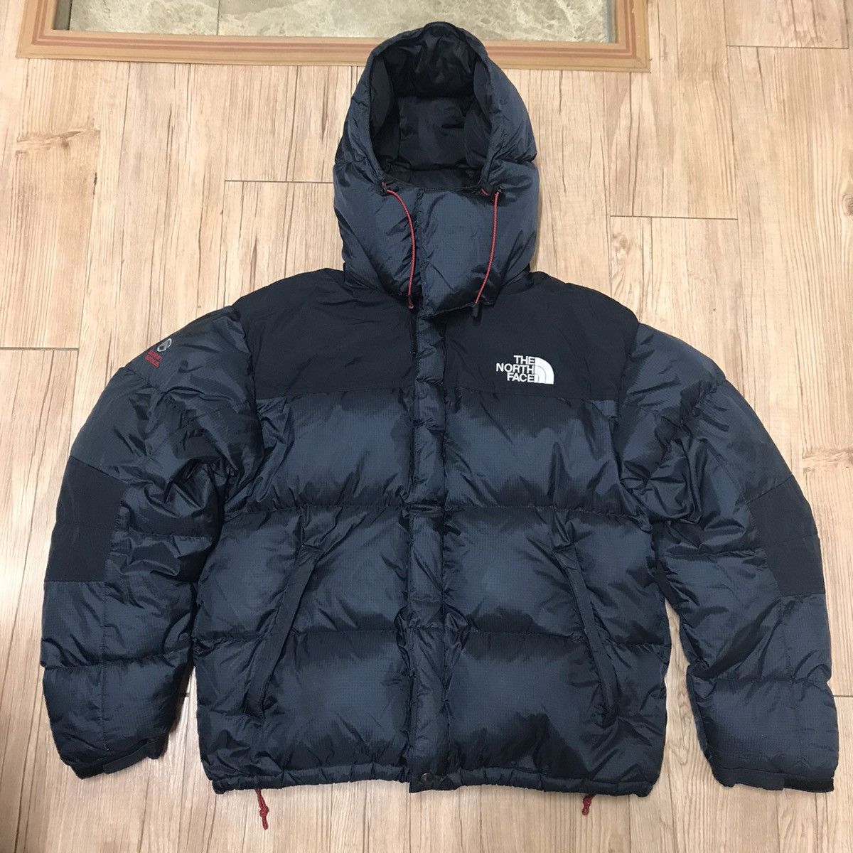 image of The North Face Baltoro 700 Puffer Jacket in Black, Men's (Size Medium)