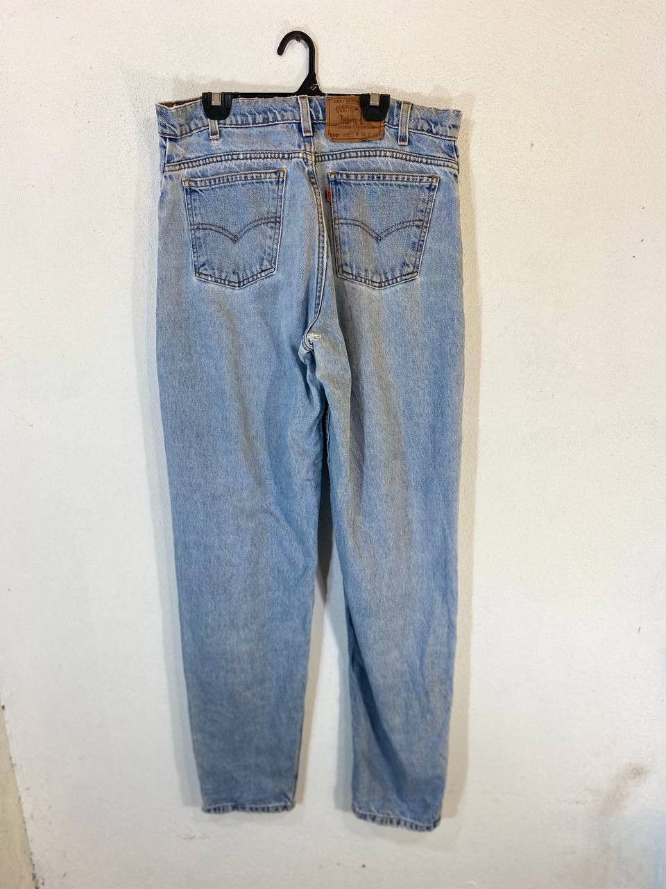 image of Distressed Denim x Levis Vintage Levis 550 Orange Tab Relaxed Fit Denim in Light Blue (Size 33)
