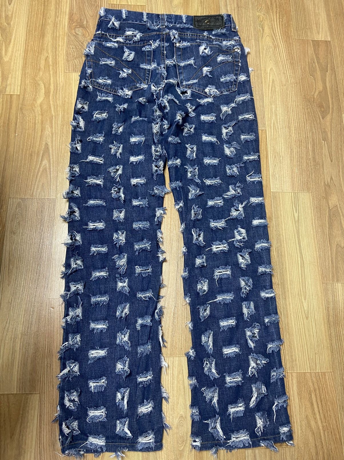 27 Vivienne westwood 'cut and slash' distressed denim pants