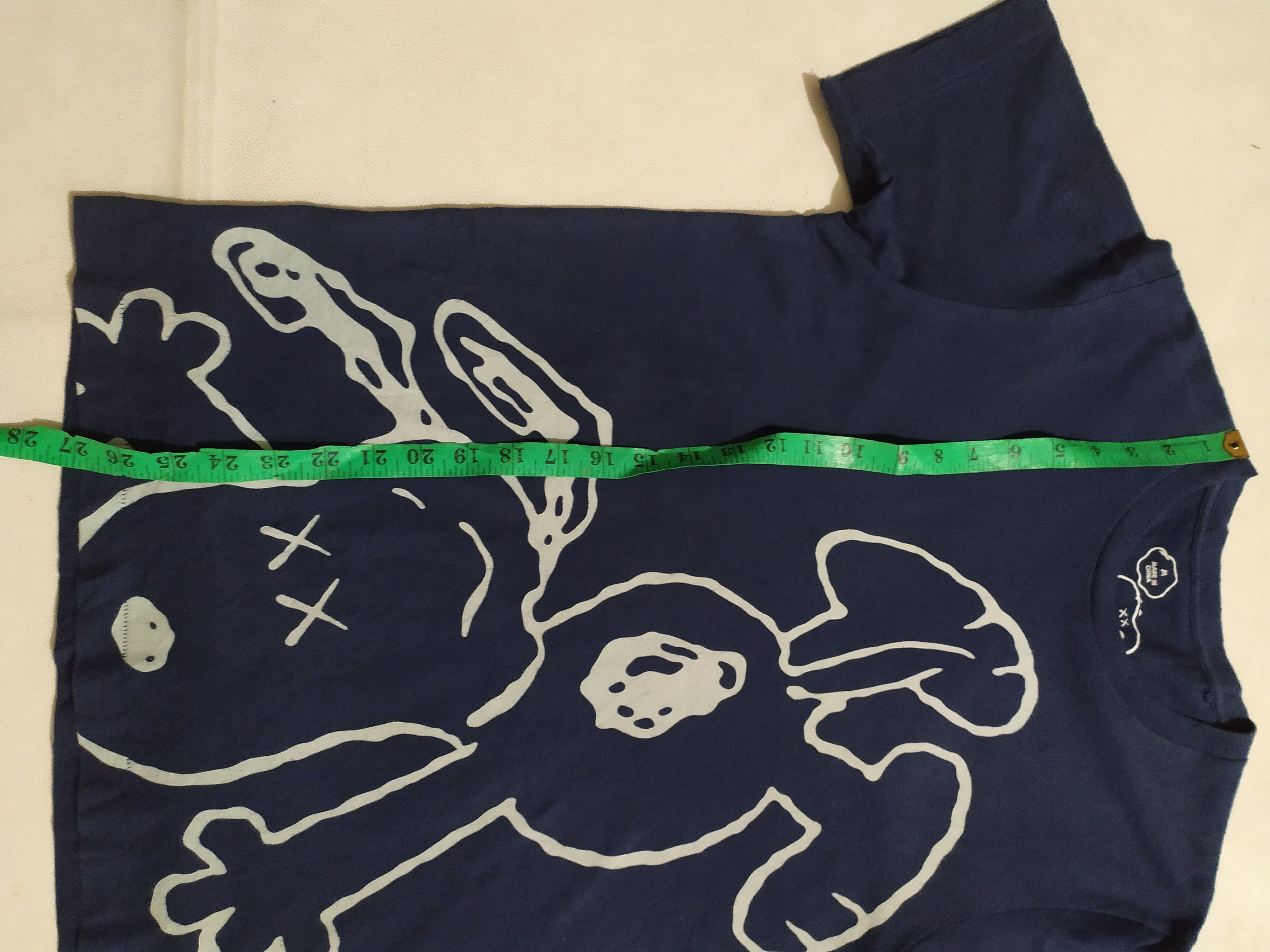 Disney × Kaws × Uniqlo 🔥Uniqlo x Kaws x Peanuts T-shirt Size US M / EU 48-50 / 2 - 9 Thumbnail