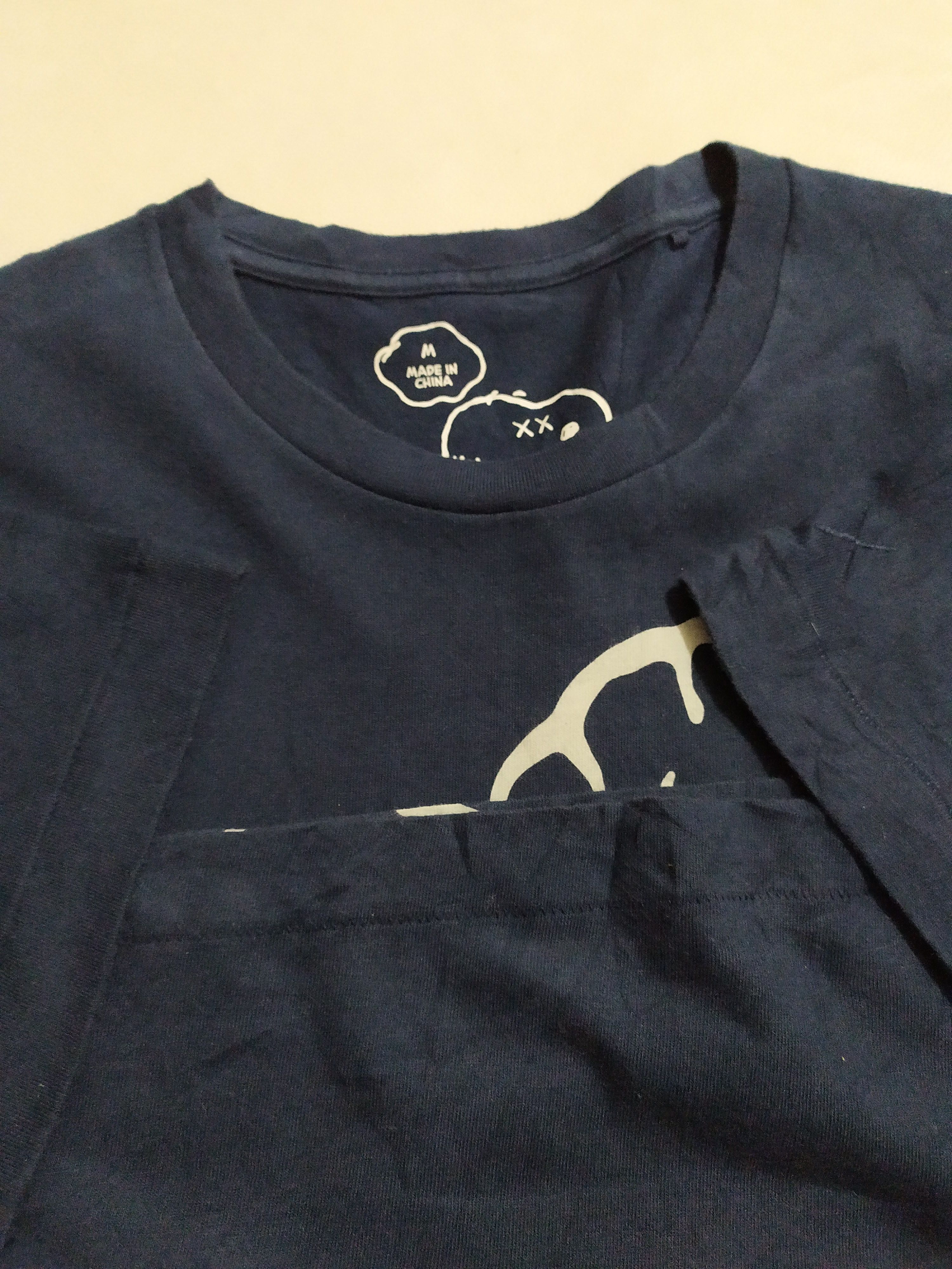 Disney × Kaws × Uniqlo 🔥Uniqlo x Kaws x Peanuts T-shirt Size US M / EU 48-50 / 2 - 4 Thumbnail