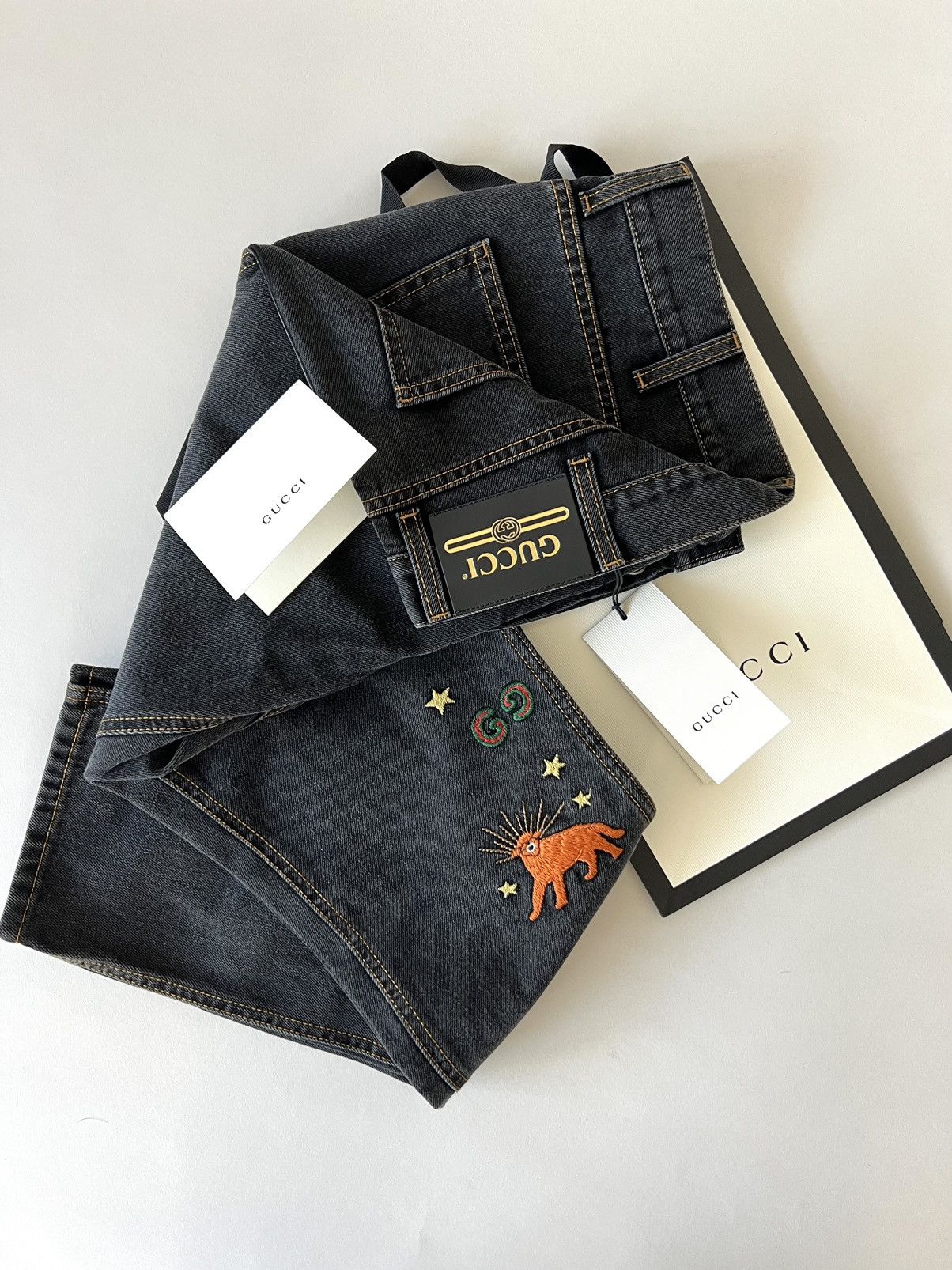 image of $1.4K Value Gucci Logo Embroidered Tiger Patch Denim Jeans in Black, Men's (Size 33)