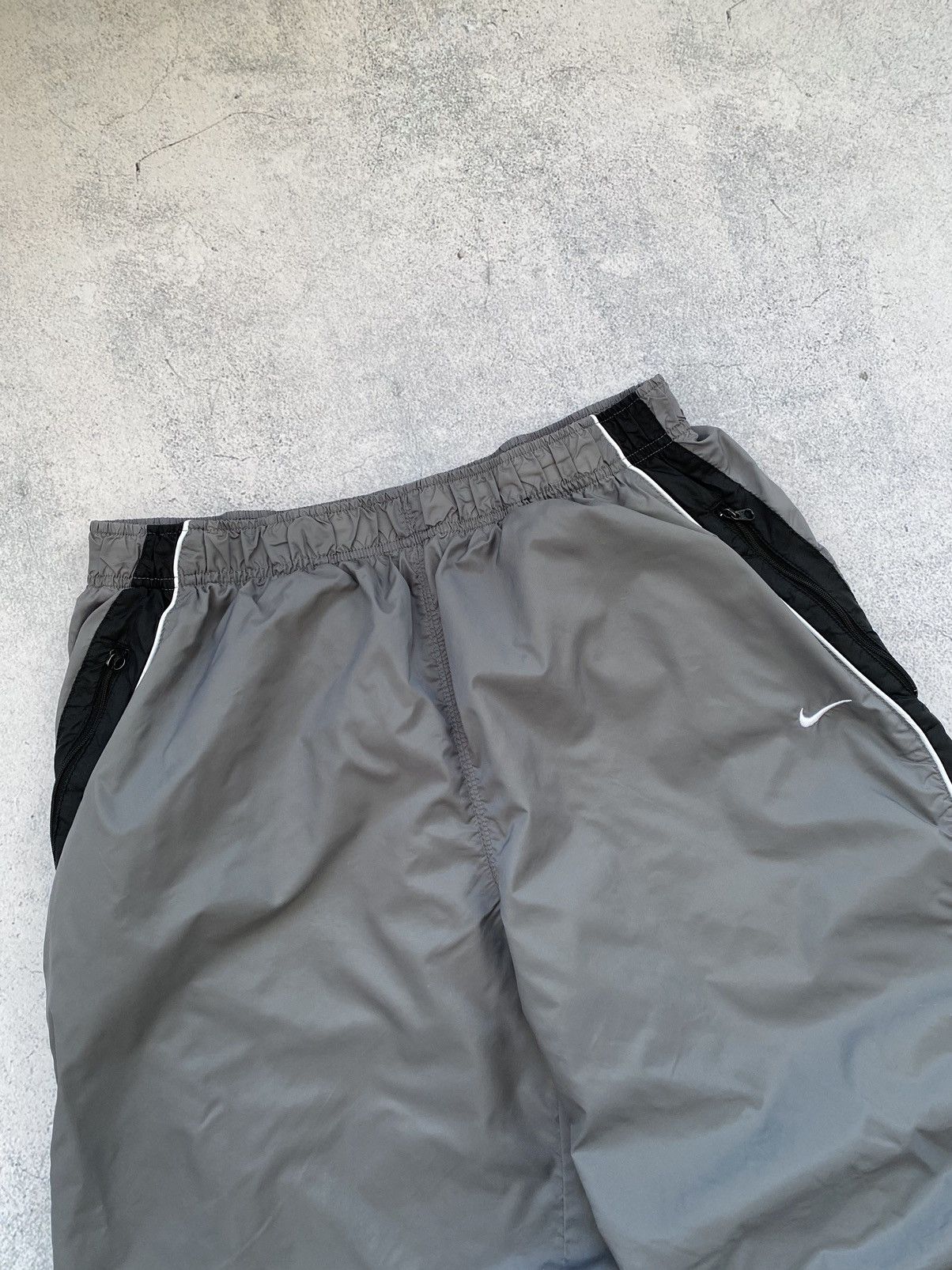 double swoosh track pants