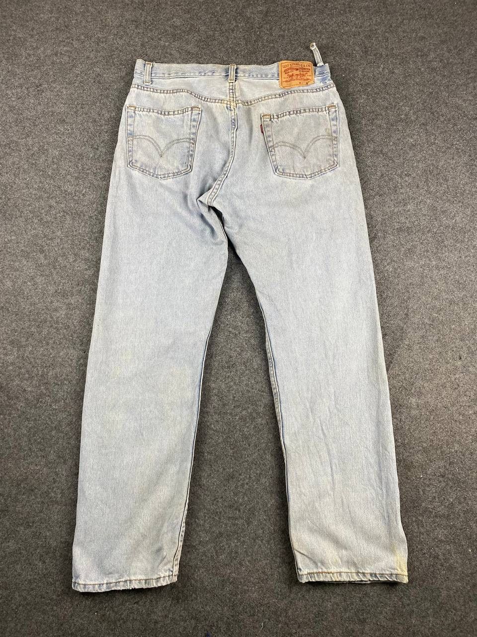 image of 505 Regular Fit Light Wash Distressed Denim in Light Blue, Men's (Size 36)