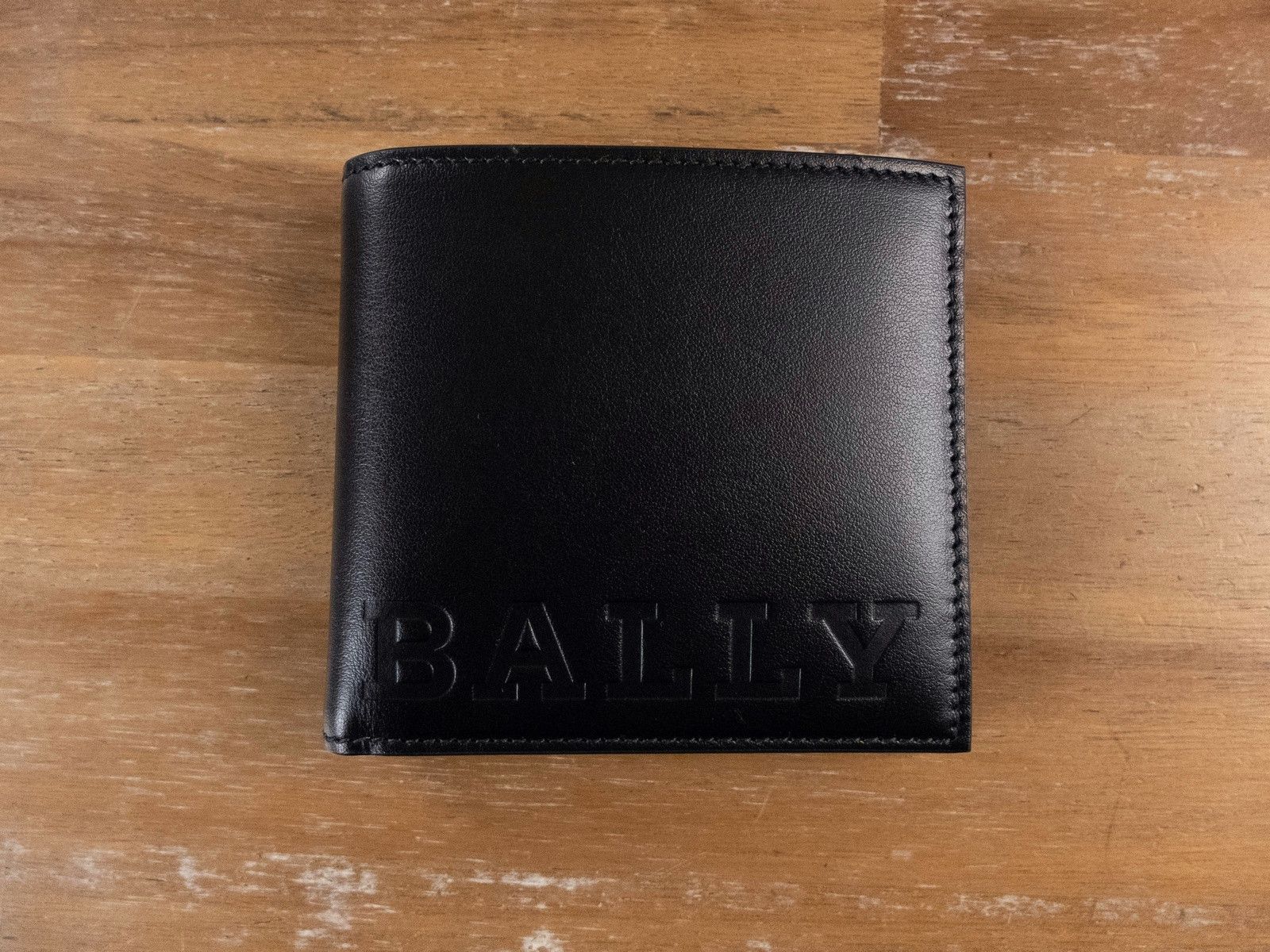 image of Bally Switzerland Embossed Black Leather Bifold Wallet Nwt, Men's