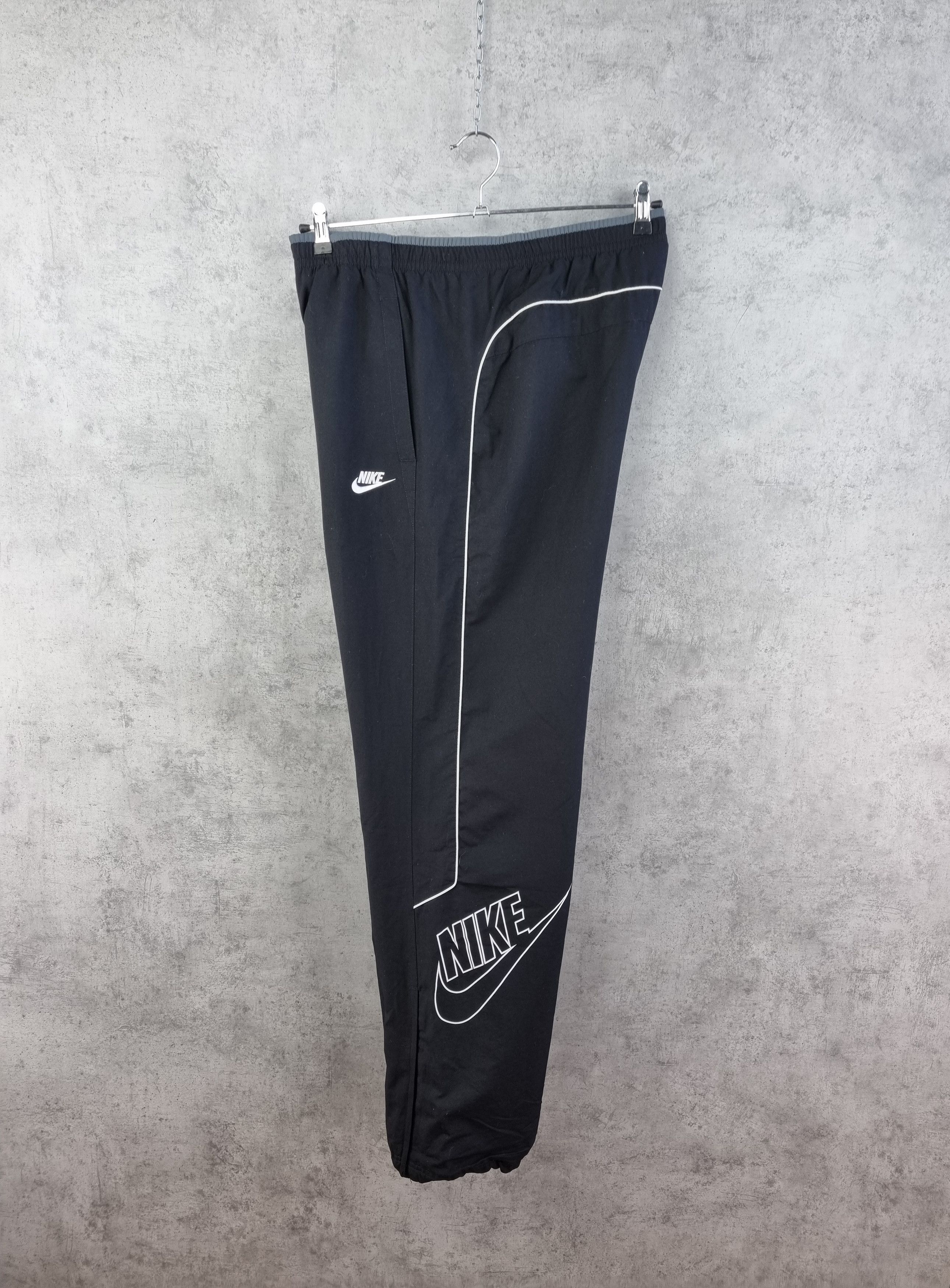 Nike × Vintage Rare Nike Swoosh Big Logo Nylon Sport Pant Size US 33 - 1 Thumbnail