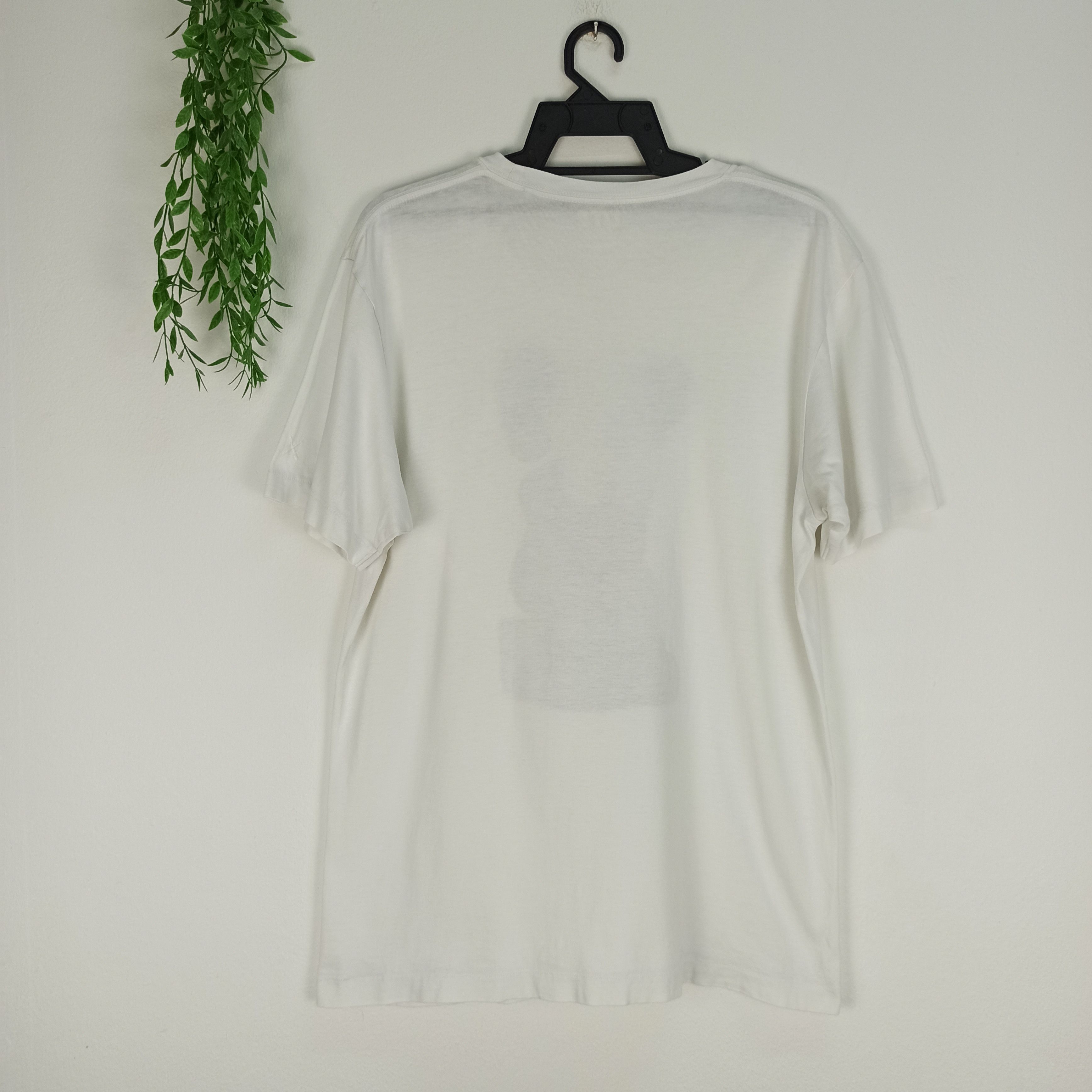 Anime Rare Kaws Sad X Uniqlo Tshirt Size US L / EU 52-54 / 3 - 4 Thumbnail