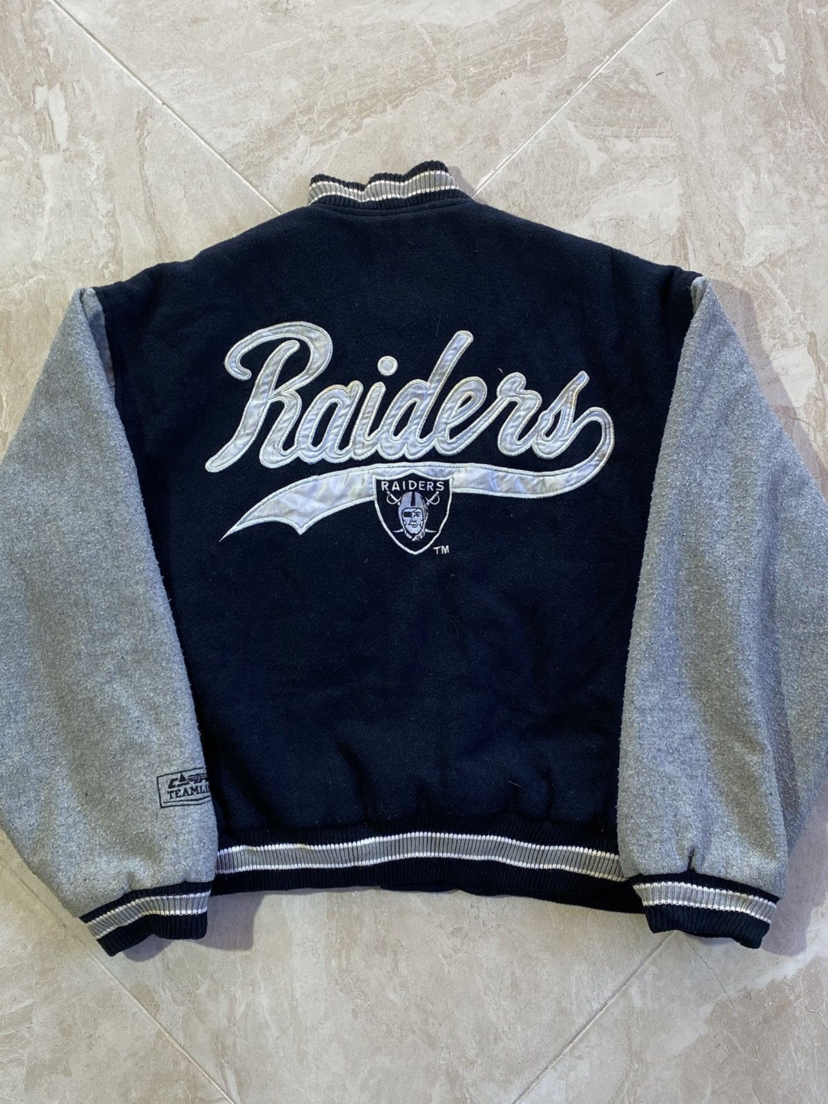 Vintage 1993 Oakland Raiders NFL wool bomber jacket