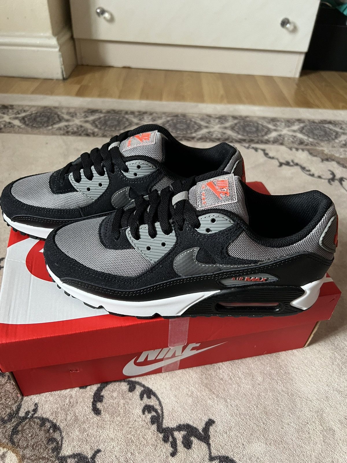 This Nike Air Max 90 Comes In Black Flat Pewter And Picante Red