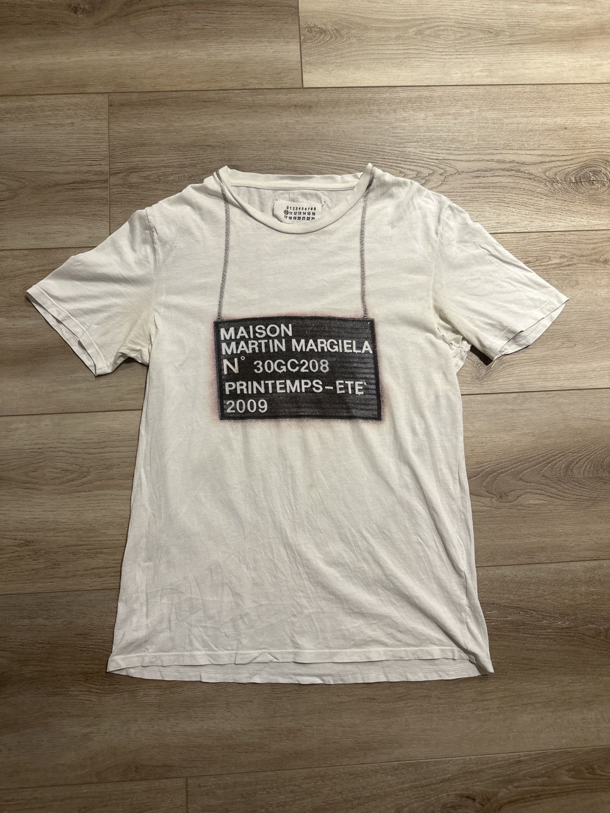 Maison Margiela 2009 mugshot tee | Grailed