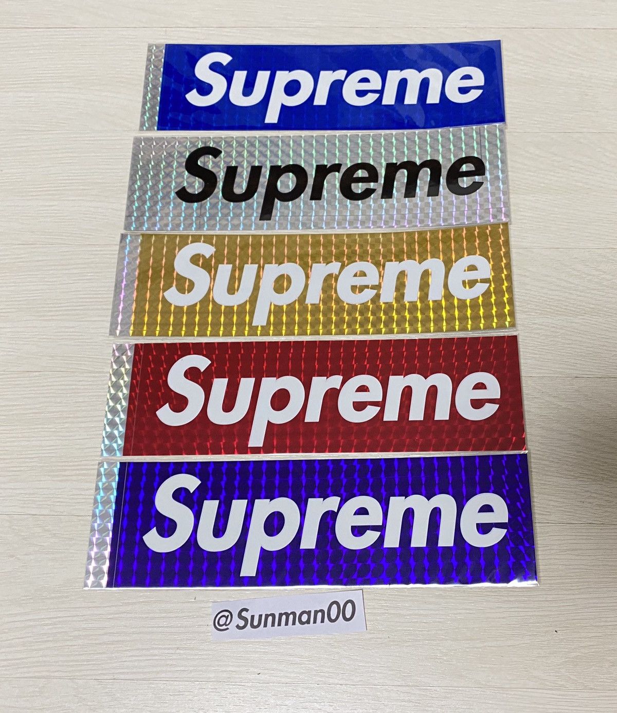 Holographic supreme box clearance logo