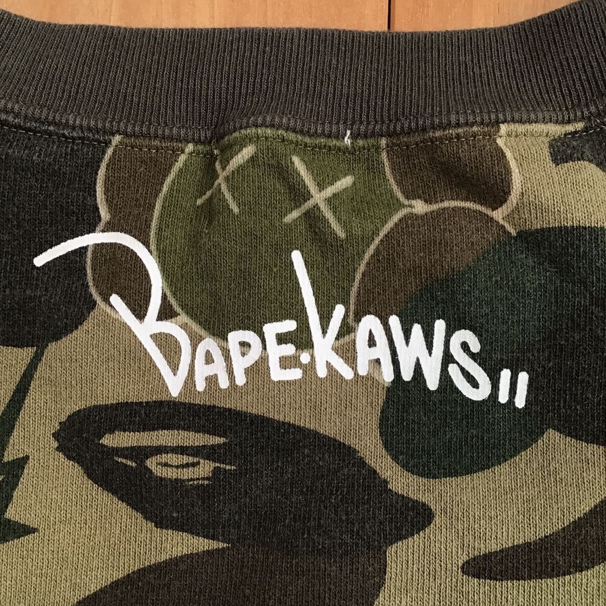 Bape × Kaws KAWS × BAPE camo bendy sweat shirt a bathing ape NIGO Size US M / EU 48-50 / 2 - 4 Thumbnail