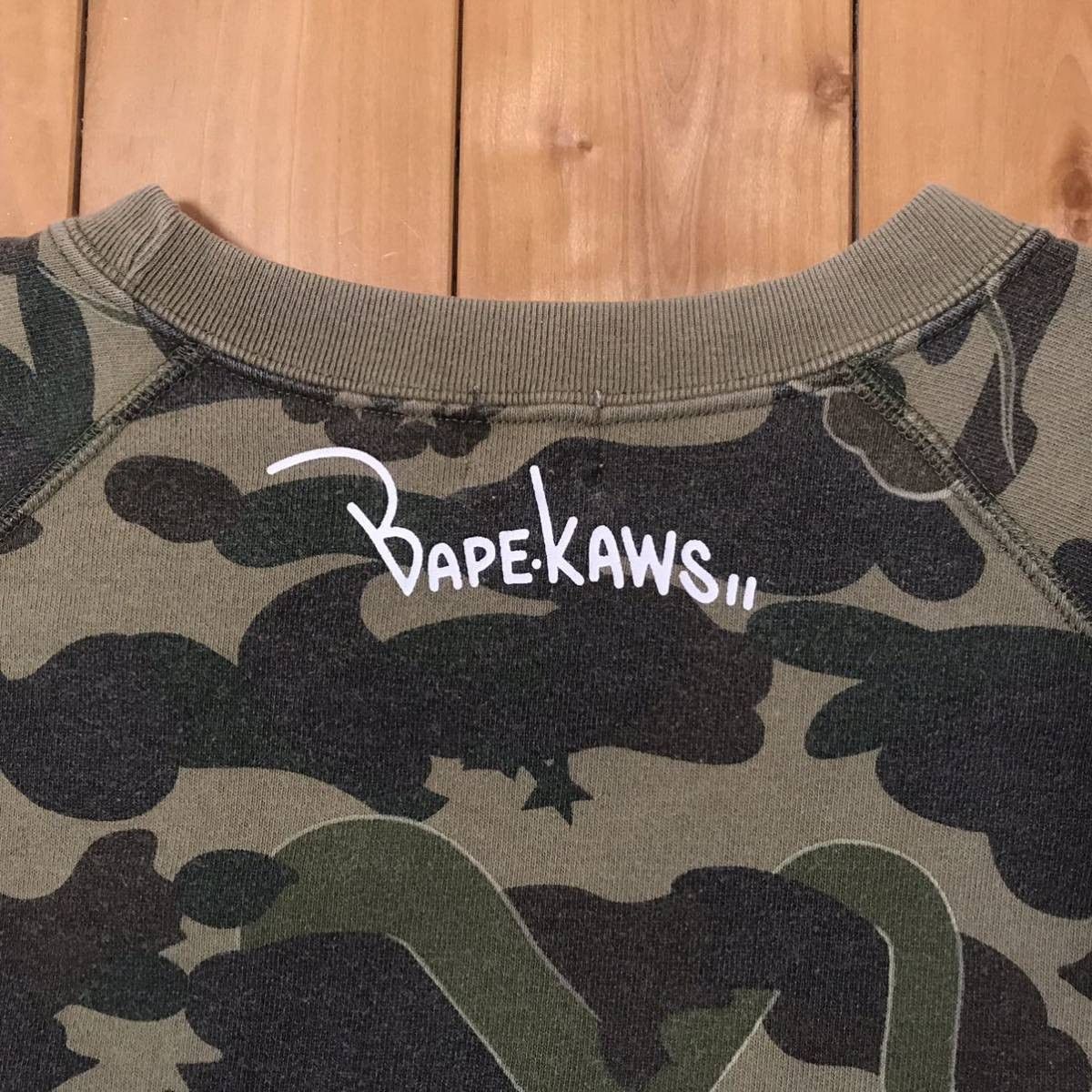 Bape × Kaws KAWS × BAPE camo bendy sweat shirt a bathing ape NIGO Size US S / EU 44-46 / 1 - 4 Thumbnail