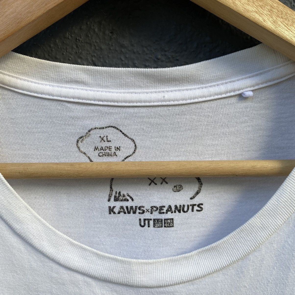 Kaws × Peanuts × Uniqlo Thrashed Kaws x Peanuts x Uniqlo ERD GRUNGE VINTAGE TEE Size US XL / EU 56 / 4 - 5 Thumbnail