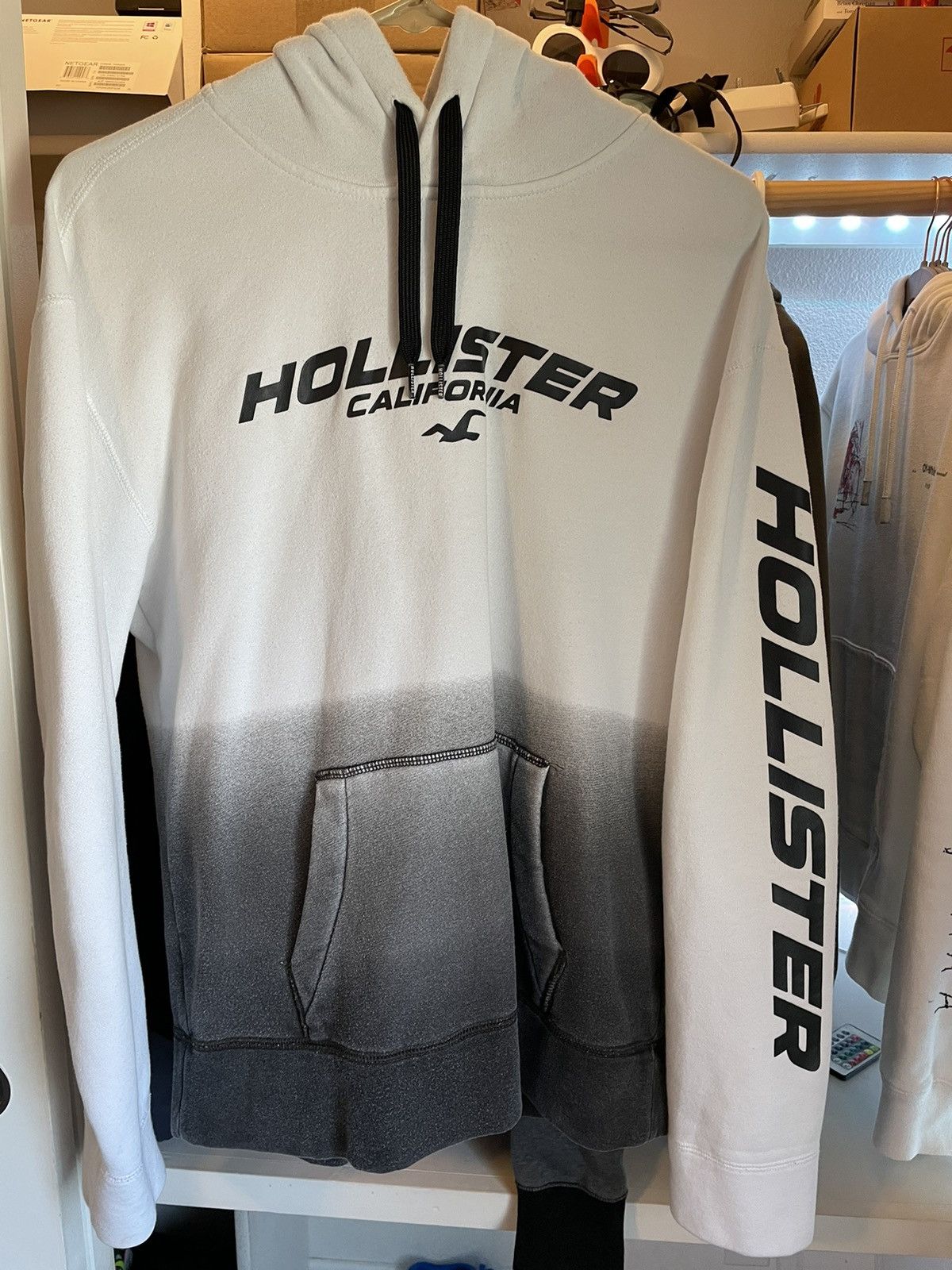 Black and discount white hollister hoodie