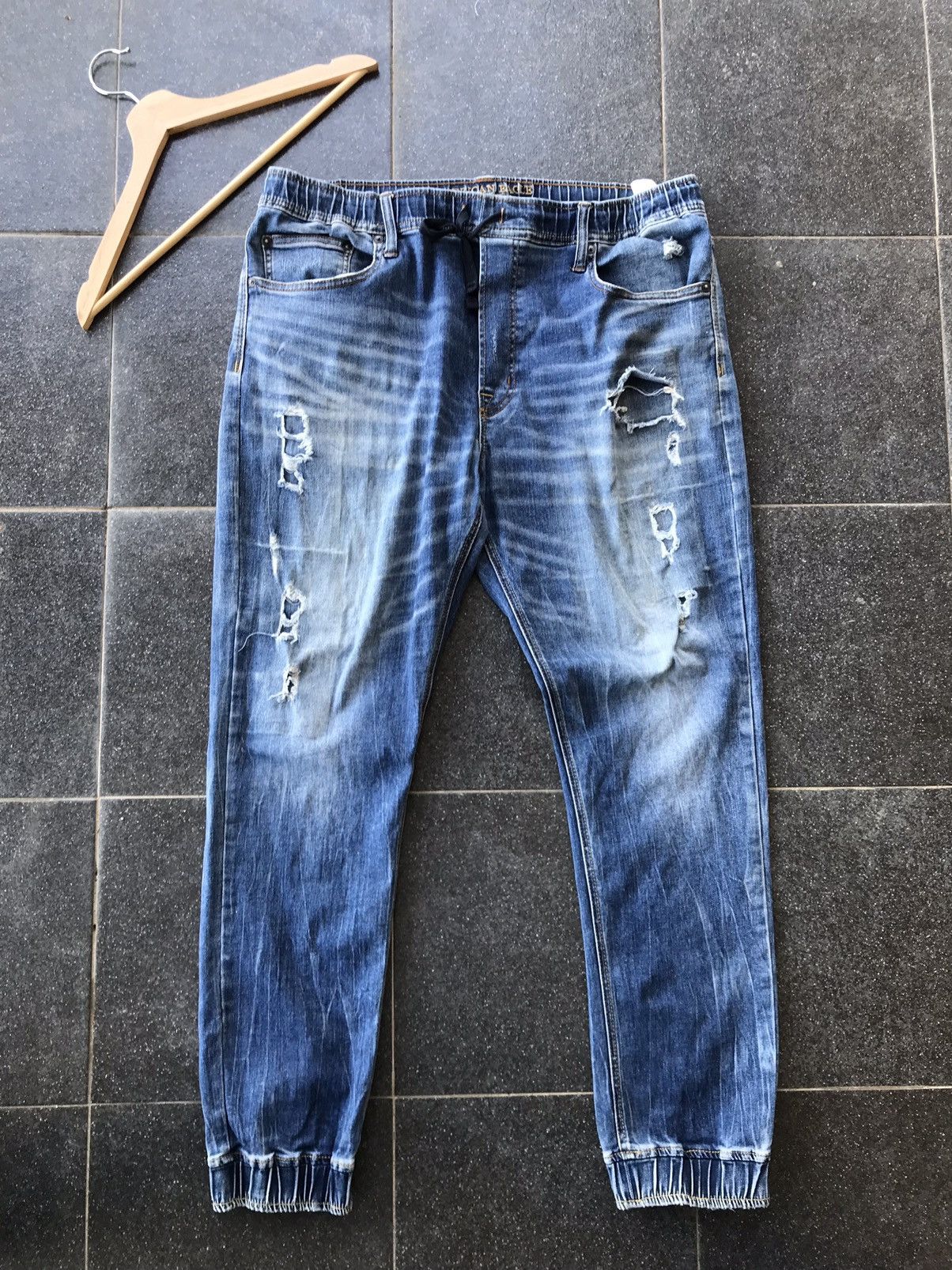 image of American Eagle Outfitters x Vintage American Eagle Cutfitters Distressed Joggers Jeans in Blue Deni