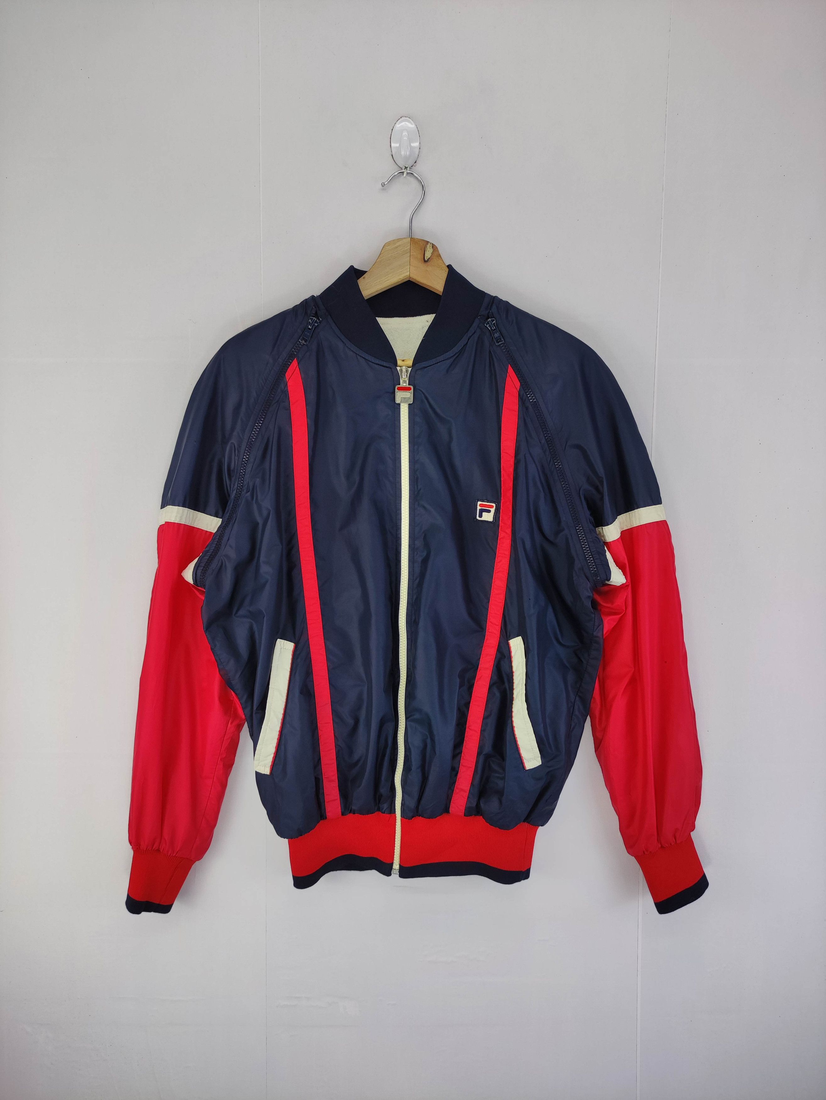 Red and blue fila jacket deals