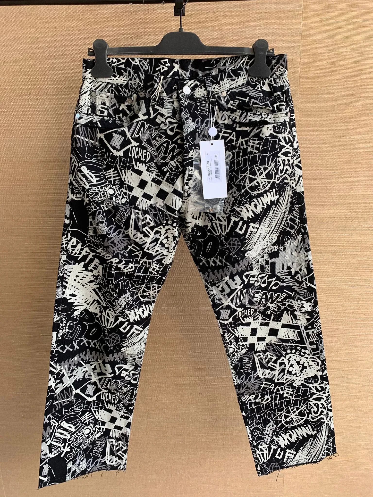 image of Maison Margiela Graffiti Denim In Black & White in Black/White, Men's (Size 31)