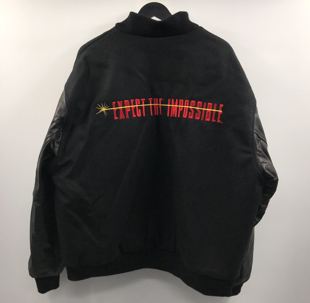 image of Mission Impossible 1996 Apple Leather Varsity Black Jacket, Men's (Size XL)